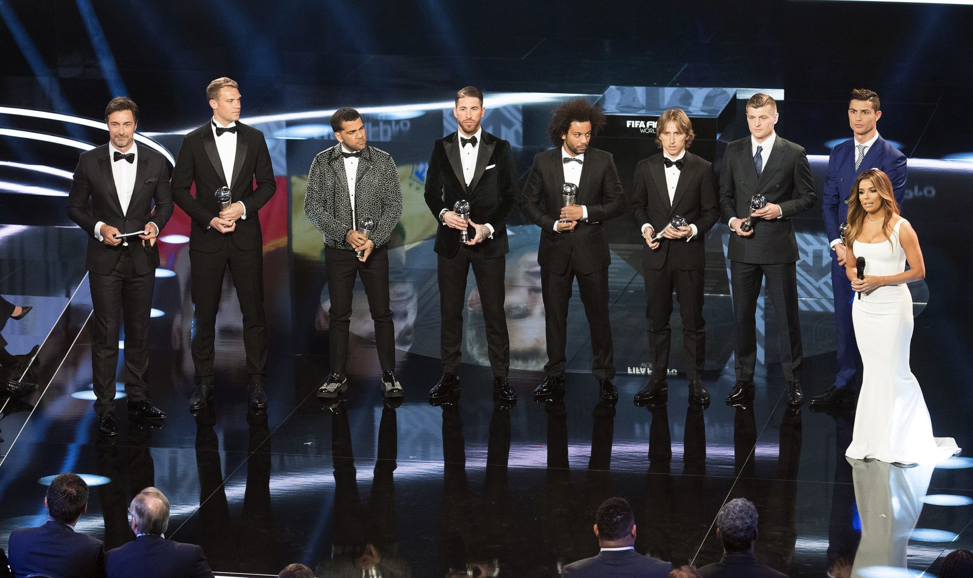 epa05708043 (L-R) Host Marco Schreyl, winners of the FIFA FIFPro World11 Manuel Neuer (Germany, Bayern Munich), Dani Alves (Brazil, FC Barcelona and Juventus FC), Sergio Ramos (Spain, Real Madrid), Marcelo (Brazil, Real Madrid), Luka Modric (Croatia, Real Madrid), Toni Kroos (Germany, Real Madrid), Cristiano Ronaldo (Portugal, Real Madrid) and host Eva Longoria attend the FIFA Awards 2016 gala at the Swiss TV studio in Zurich, Switzerland, 09 January 2017. The best soccer player of 2016 will be chosen during the ceremony.  EPA/ENNIO LEANZA