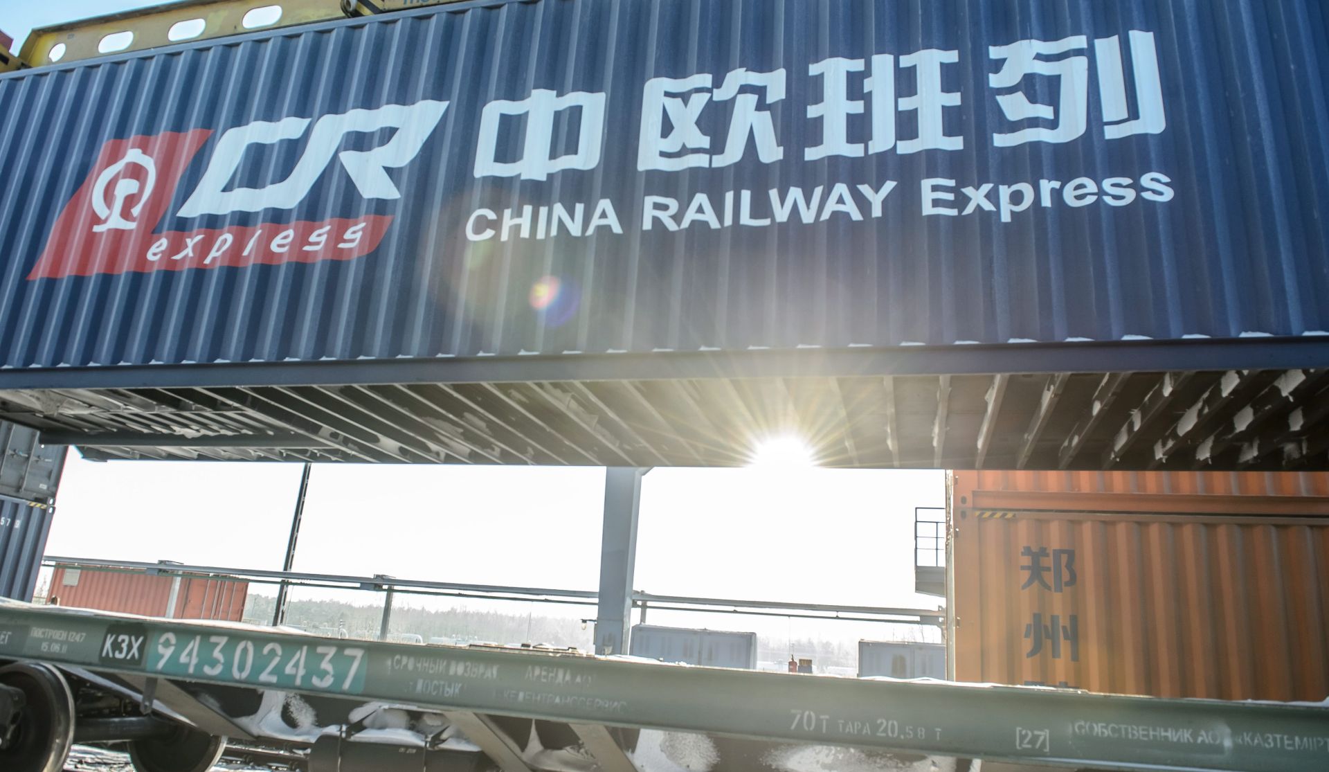 epa05710494 Containers of a freight train from China to the UK are handled at the logistics center in Malaszewicze, near the Poland-Belarus border crossing, eastern Poland, 11 January 2017. The first direct freight train from China to the London has crossed into Poland, one of the nine countries on its 12,000 km long journey from Zhejiang Province. London has become the 15th European city belonging to the New Silk Road.  EPA/WOJCIECH PACEWICZ POLAND OUT