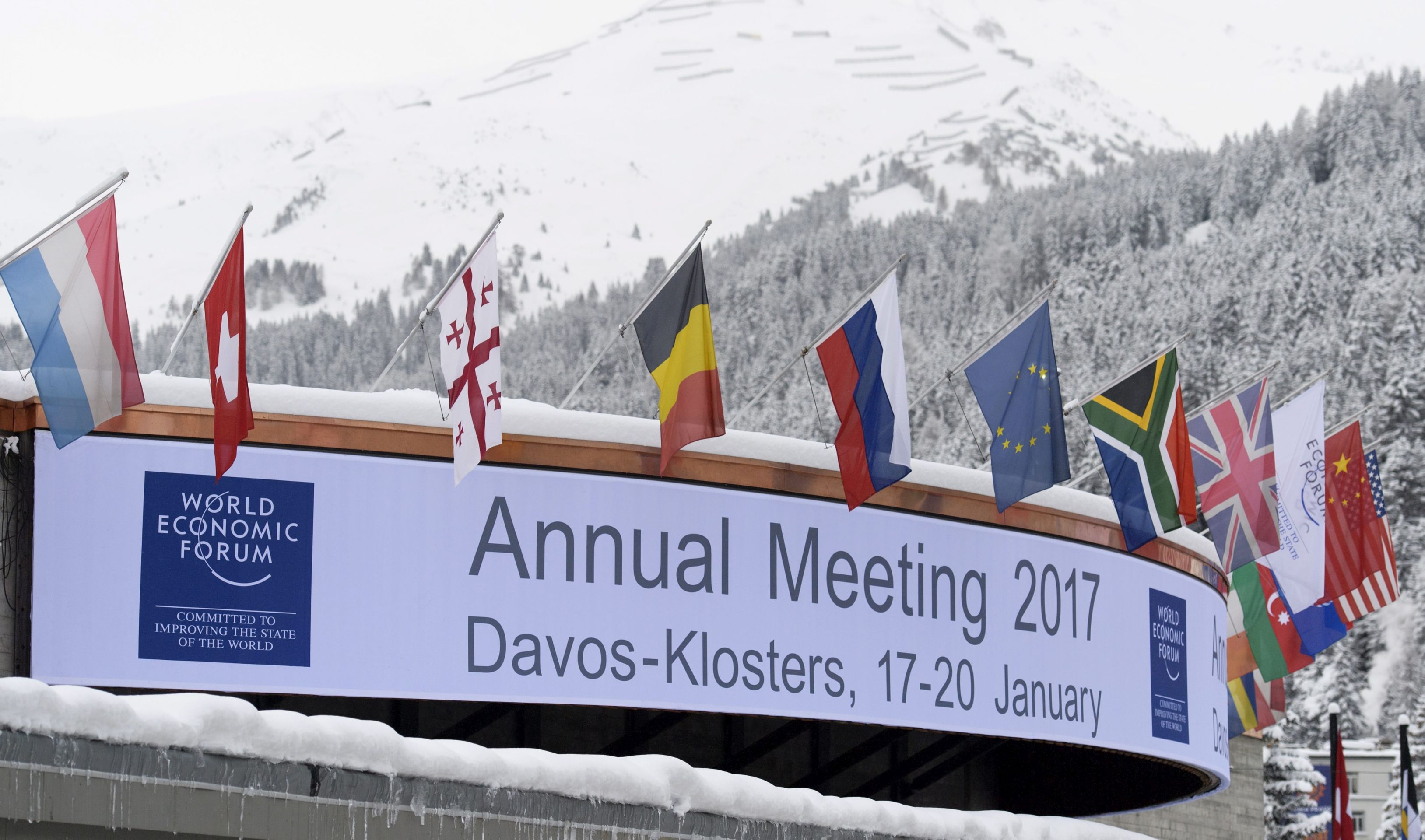 epa05718659 View of the entrance to the Congress Centre where preparations are taking place for the upcoming 47th Annual Meeting of the World Economic Forum (WEF) in Davos, Switzerland, 15 January 2017. The annual meeting brings together business leaders, international political leaders and select intellectuals, to discuss the pressing issues facing the world. The overarching theme of the 2017 meeting, which takes place from 17 to 20 January, is 'Responsive and Responsible Leadership'.  EPA/GIAN EHRENZELLER