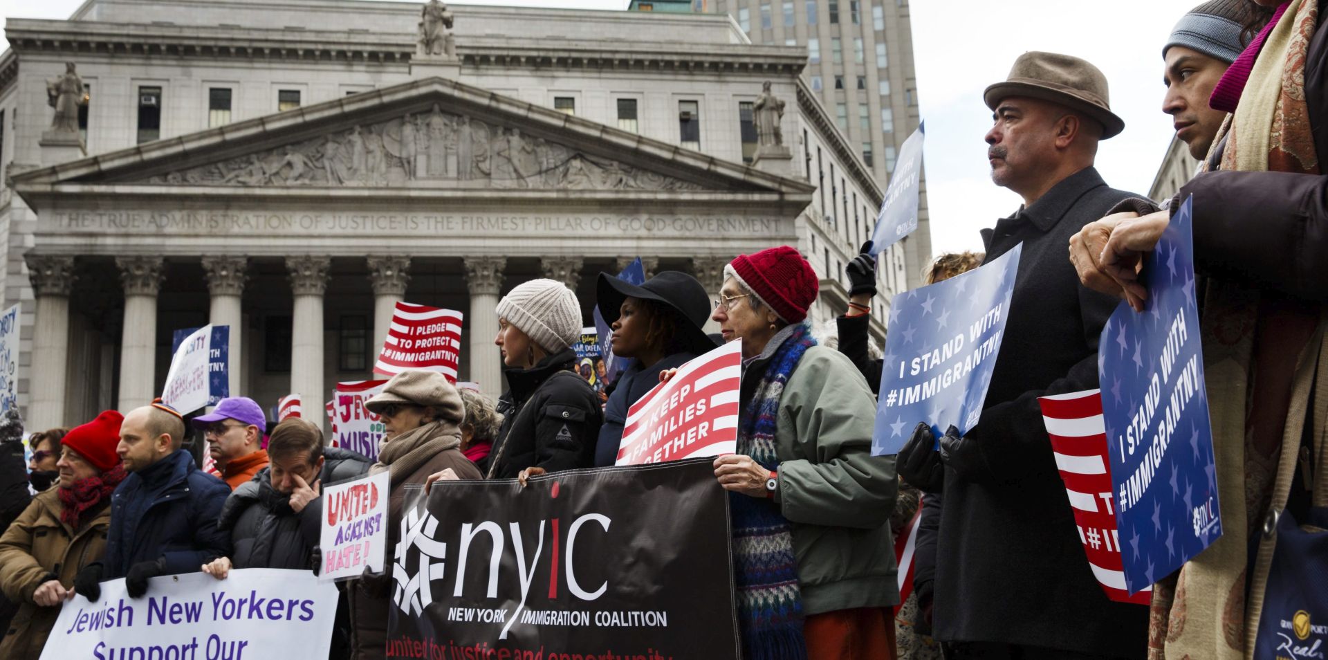 epa05755393 People gather for an interfaith rally to show support for the Muslim and immigrant communities in New York, New York, USA, 27 January 2017. The rally was organized in response to proposed actions by President Donald Trump.  EPA/JUSTIN LANE