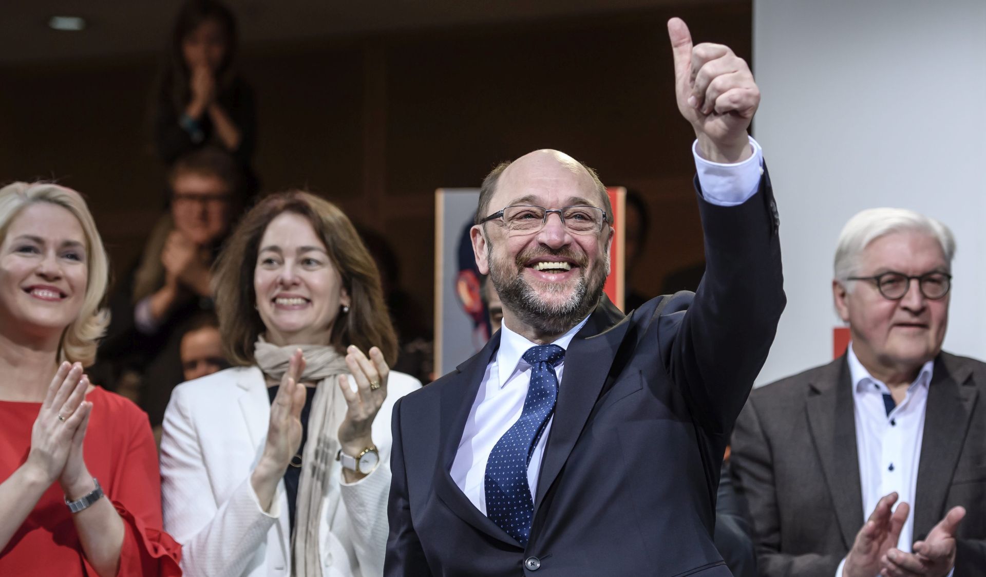 epa05758881 New appointed leader of the Social Democratic Party (SPD) and candidate for chancellor, Martin Schulz gestures at the SPD headquarters Willy Brandt House in Berlin, Germany, 29 January 2017. In the background (L-R) German Family Minister Manuela Schwesig, SPD secretary general Katarina Barley, and former foreign minister Frank-Walter Steinmeier.  Schulz was officially nominated by the party chair at the meeting and is scheduled to be elected as party chairman during a extraordinary party confention in March.  EPA/CLEMENS BILAN