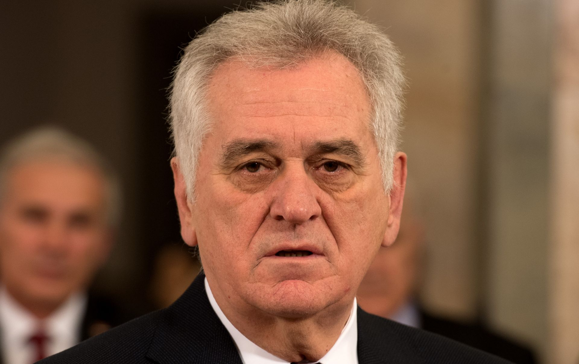 06.01.2017., Beograd, Srbija - Predsjednik Republike Srbije Tomislav Nikolic unosi Badnjak u zgradi Predsjednistva Srbije u Beogradu. Pravoslavni vjernici u Srbiji obiljezavaju Badnji dan. Photo: Srdjan Ilic/PIXSELL
