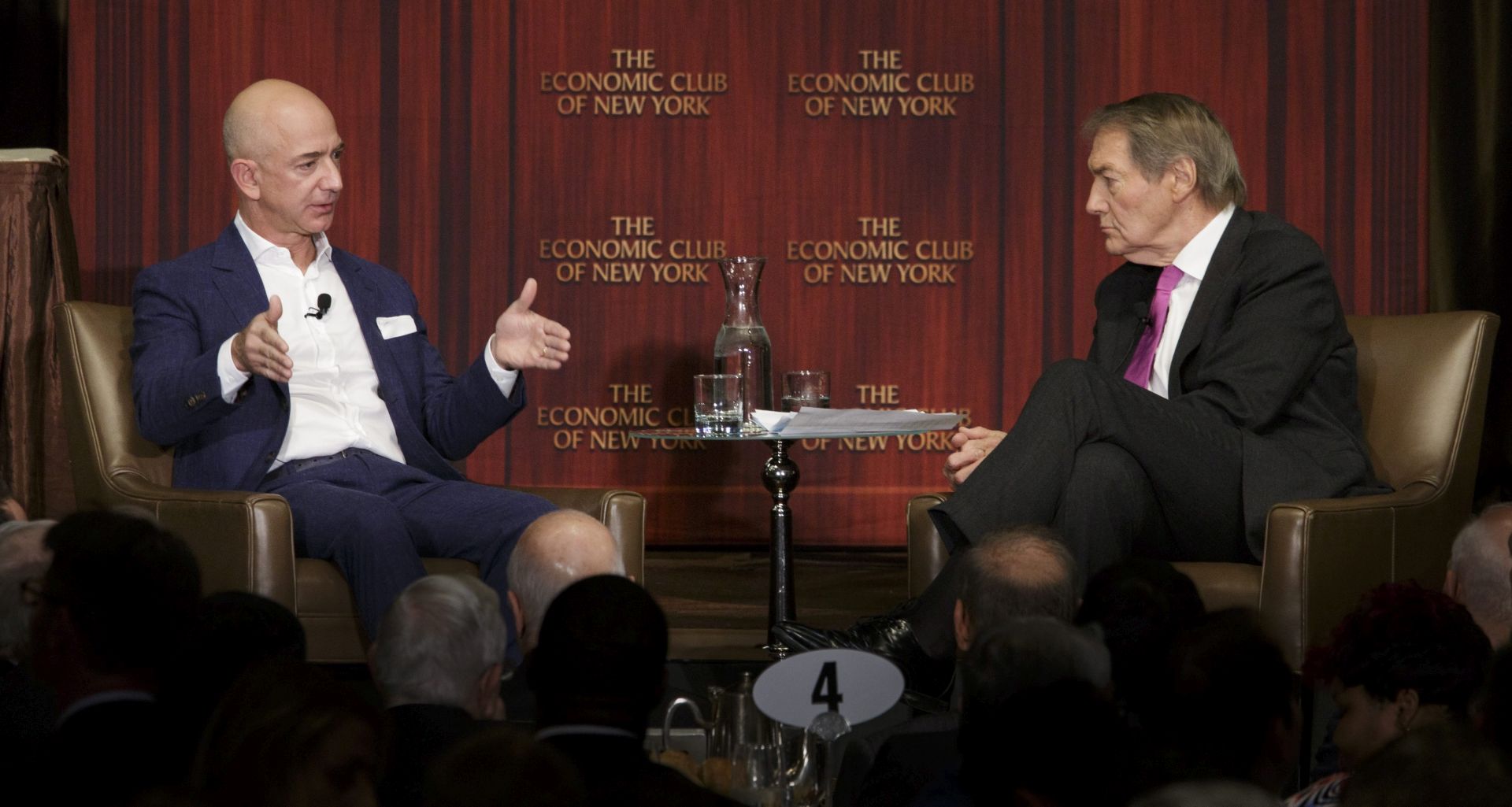 epa05606076 Jeff Bezos (L), Founder & CEO, Amazon.com, talks about his business with journalist Charlie Rose (R) during an event organized by the Economic Club of New York at a hotel in New York, New York, USA, on 27 October 2016.  EPA/JUSTIN LANE