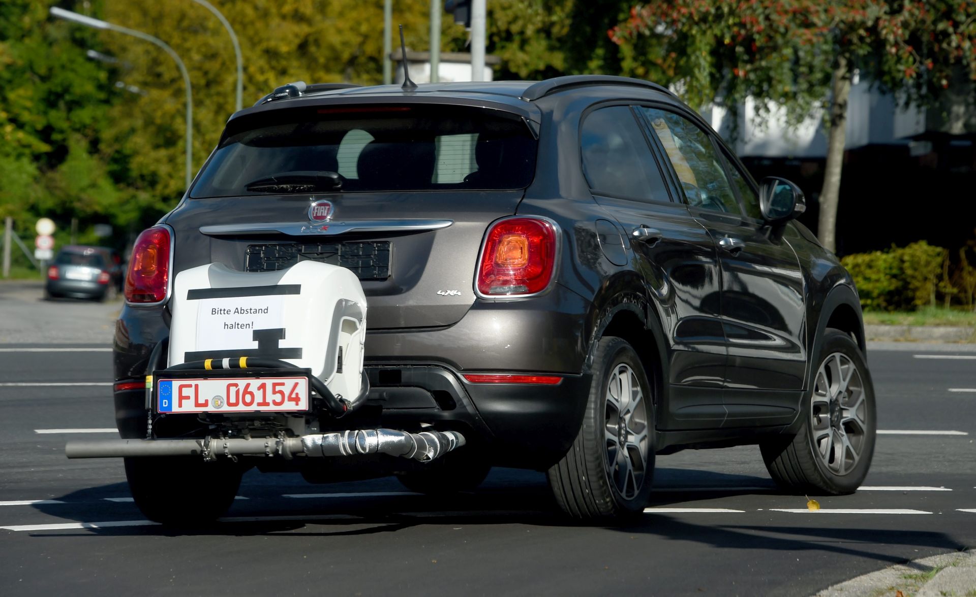 epa05570997 A Fiat car outfitted with a test machine from the Federal Motor Transport Authority (KBA) drives through Flensburg, Germany, 05 October 2016. German Transport Minister Dobrindt still wants to proceed with unannounced emissions tests in autumn. The Federal Motor Transport Authority is now equipped with the necessary technology.  EPA/CARSTEN REHDER