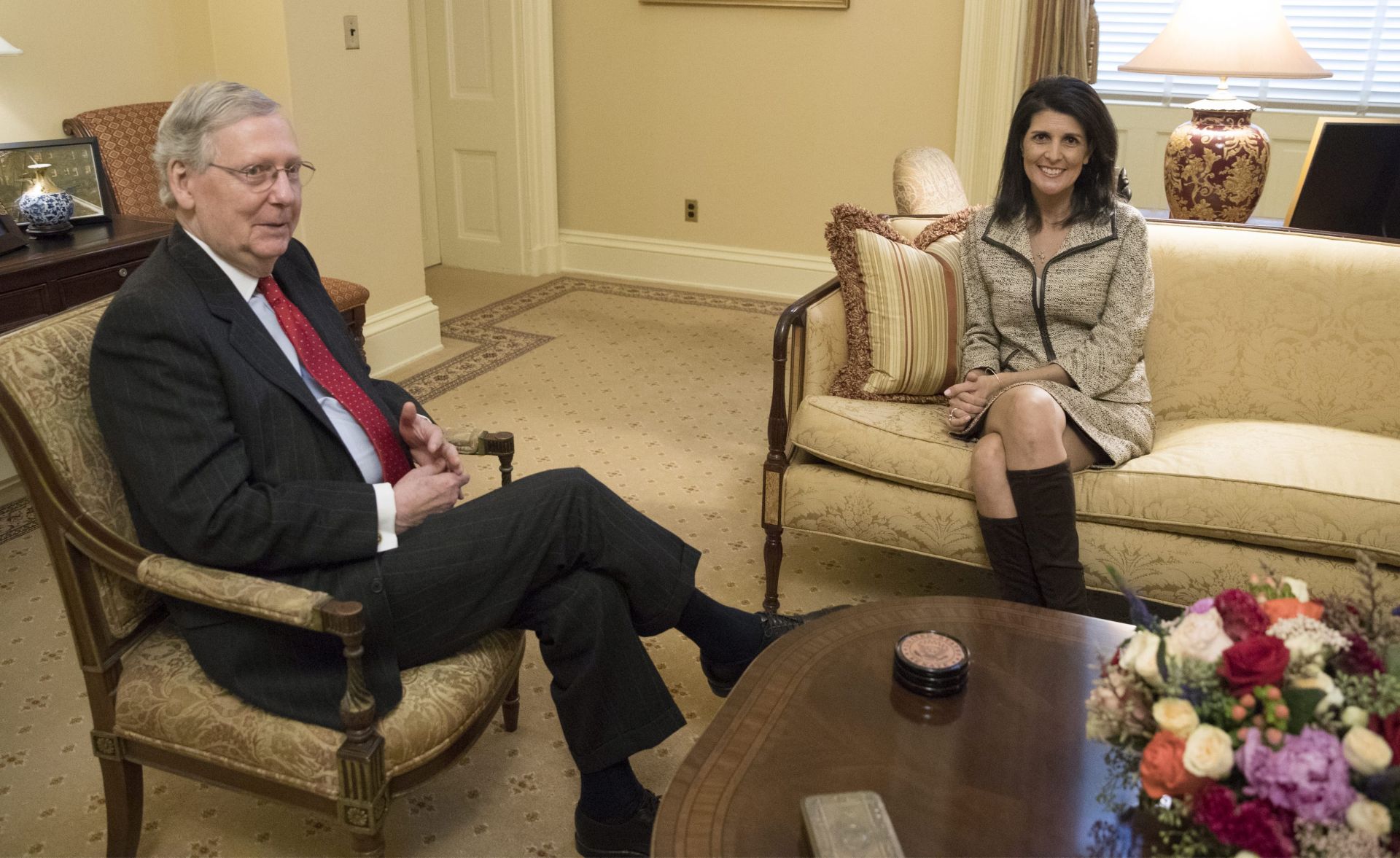 epa05666003 Republican Governor of South Carolina Nikki Haley (R) meets with US Senate Majority Leader Republican Mitch McConnell (L) in the Majority Leader's office on Capitol Hill in Washington, DC, USA, 08 December 2016. Haley is President-elect Donald Trump's pick to be the next US Ambassador to the United Nations.  EPA/MICHAEL REYNOLDS