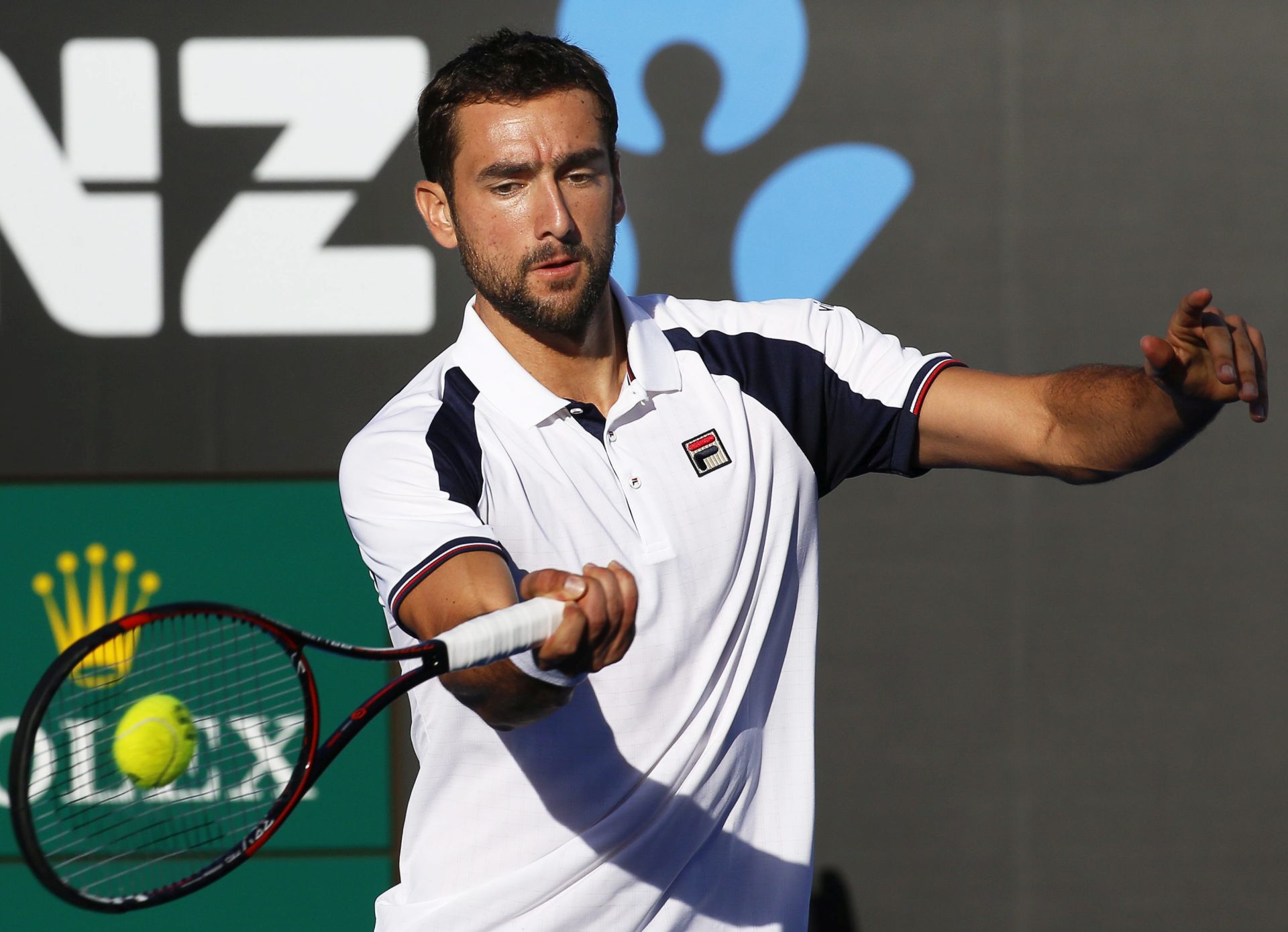 epa05726880 Marin Cilic of Croatia in action against Daniel Evans of Britain during their men's Singles second round match of the Australian Open Grand Slam tennis tournament in Melbourne, Australia, 18 January 2017.  EPA/LYNN BO BO