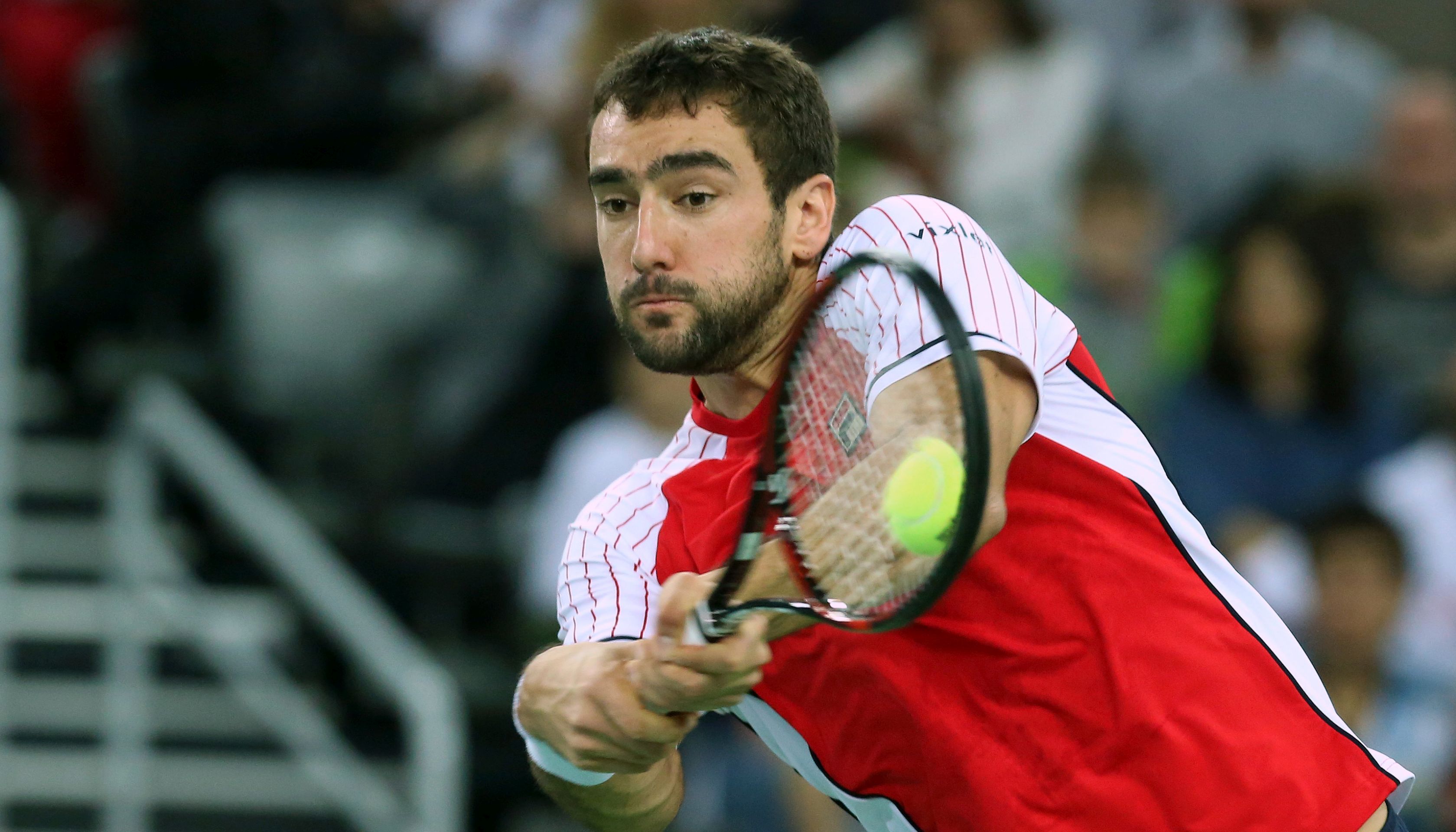 Zagreb, 26.11.2016. Drugog dana finala Davis Cupa izmeðu reprezentacija Hrvatske i Argentine na teren su izali Marin Èiliæ i Ivan Dodig, koji su zaigrali protiv argentinskog para, Juana Martina del Potra i Leonarda Mayera. Na fotografiji Marin Èiliæ.
foto HINA/ Daniel KASAP/ mm