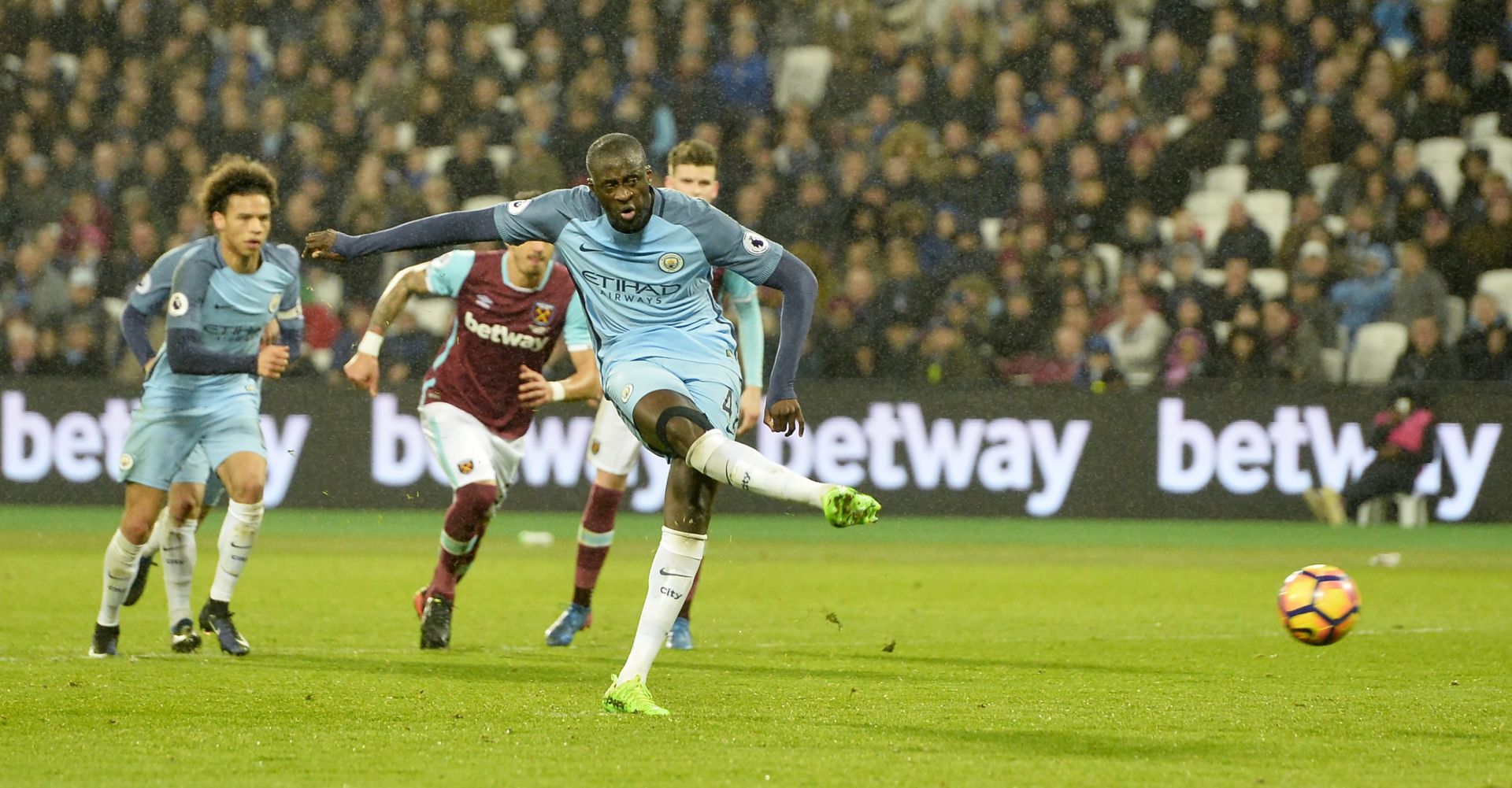 epa05765469 Manchester City's Yaya Toure  scores a penalty during the English Premier League soccer match between West Ham and Manchester City at the London Stadium in London, Britain, 01 February 2017. 
EDITORIAL USE ONLY. No use with unauthorized audio, video, data, fixture lists, club/league logos or 'live' services. Online in-match use limited to 75 images, no video emulation. No use in betting, games or single club/league/player publications  EPA/HANNAH MCKAY