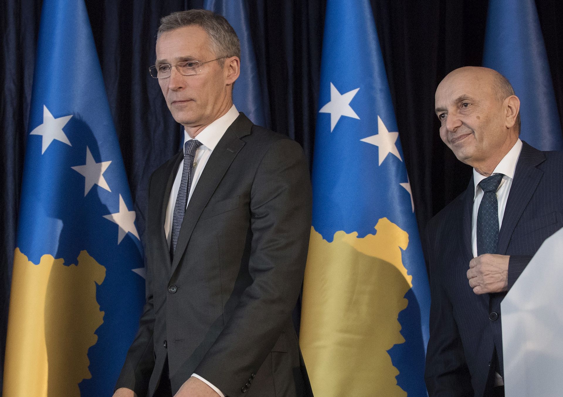 epa05768862 Prime Minister of the Republic of Kosovo Isa Mustafa (R) and NATO Secretary General Jens Stoltenberg (L) arrive for the joint press conference in Pristina, Kosovo, 03 February 2017. NATO Secretary General Jens Stoltenberg is on a one day official visit in Kosovo.  EPA/VALDRIN XHEMAJ