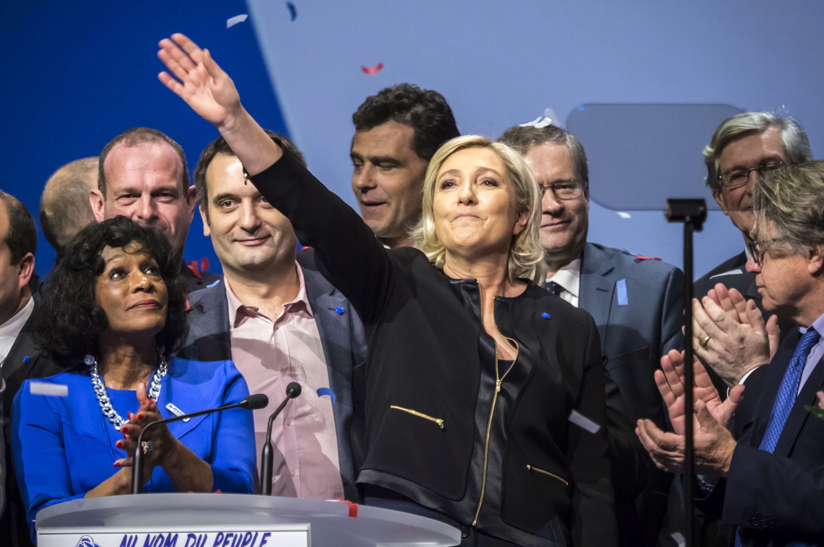 epa05773138 Leader of France's far-right Front National political party and candidate for the 2017 French presidential elections Marine Le Pen (C) delivers a speech during the Front National political rally and start of her presidential campaign in Lyon, France, 05 February 2017. France holds the first round of the 2017 presidential elections on 23 April 2017.  EPA/ARNOLD JEROCKI