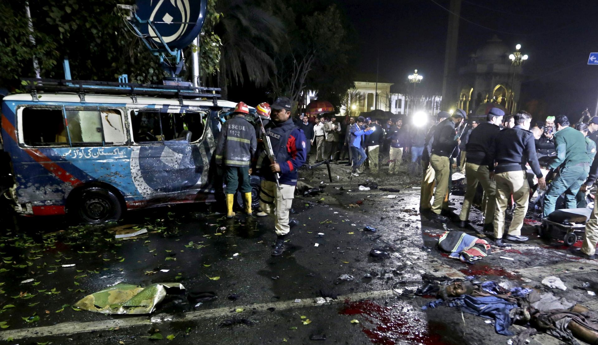 epa05791001 Security officials inspect the scene of a suicide bomb attack that targeted a protest by Pharmacists outside the Punjab provincial assembly in Lahore, Pakistan, 13 February 2017. At least 10 people were killed and several other injured in the incident.  EPA/RAHAT DAR ATTENTION EDITORS: PICTURE CONTAINS GRAPHIC CONTENT