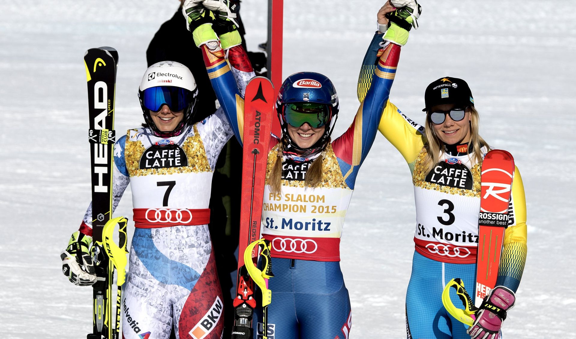epa05801554 Silver medalist Wendy Holdener, of Switzerland, left, Gold medalist Mikaela Shiffrin, of the U.S.A., center, and Bronze medalist Frida Hansdotter, of Sweden, celebrate, during the flower ceremony of the women Slalom at the 2017 FIS Alpine Skiing World Championships in St. Moritz, Switzerland, Saturday, February 18, 2017.  EPA/PETER SCHNEIDER