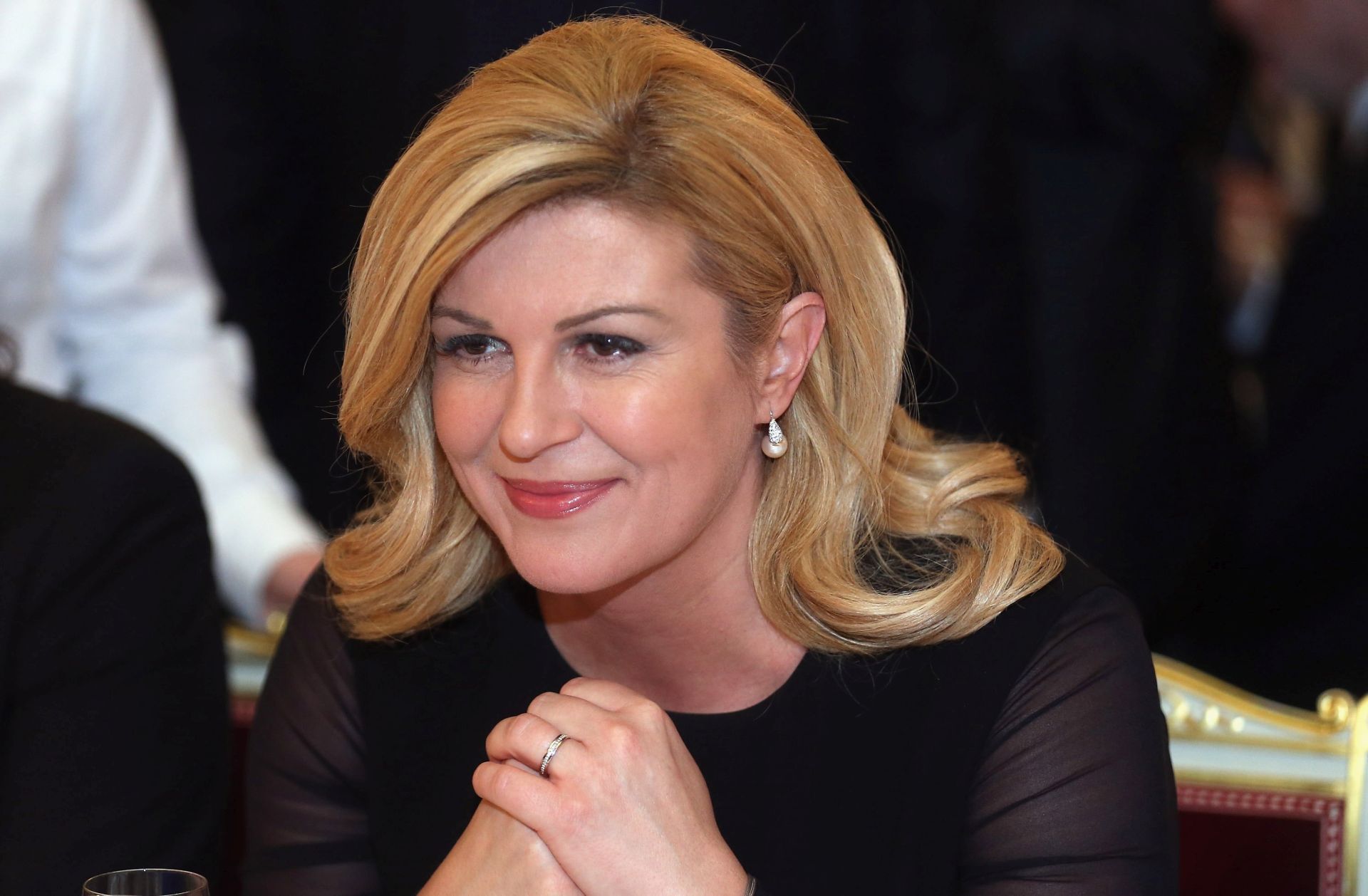 epa05802883 Kolinda Grabar Kitarovic, President of Croatia looks on during a reception at Munich royal residence during the 2017 Munich Security Conference in Munich, Germany, 18 February 2017. In their annual meeting, politicians and various experts and guests from around the world discuss issues surrounding global security from February 17 to 19.  EPA/JOHANNES SIMON / POOL
