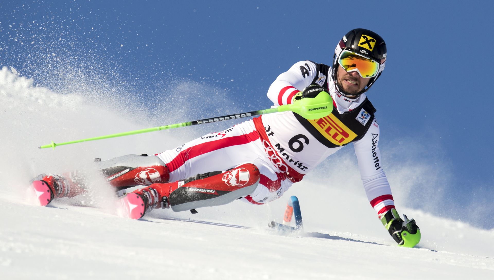 epa05803254 Marcel Hirscher, of Austria, clears a pole, during the first run of the men Slalom at the 2017 FIS Alpine Skiing World Championships in St. Moritz, Switzerland, 19 February 2017.  EPA/GIAN EHRENZELLER
