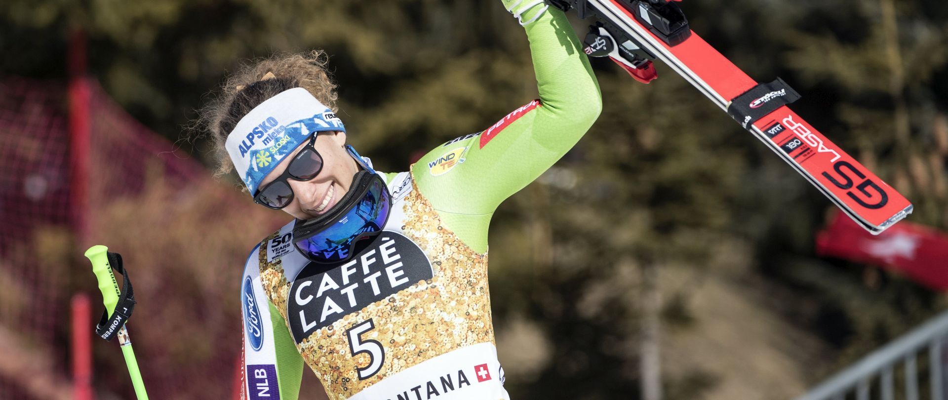 epa05814059 Ilka Stuhec from Slovenia, winner, reacts during the flower ceremony in the finish area after the women's Super-G race of the FIS Alpine Skiing World Cup in Crans-Montana, Switzerland, 25 February 2017.  EPA/ALESSANDRO DELLA VALLE