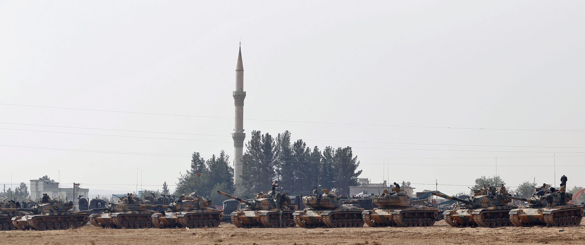 epa05509328 QUALITY REPEAT OF epa05509313

epa05509313 Turkish soldiers stand on tanks as they prepare for a military operation at the Syrian border as part of their offensive against the so-called Islamic State (ISIS or IS) militant group in Syria, in Karkamis district of Gaziantep, Turkey, 25 August 2016. The Turkish army launched an offensive operation against ISIS in Syria's Jarablus with its war jets and army troops in coordination with the US led coalition war planes.  EPA/SEDAT SUNA