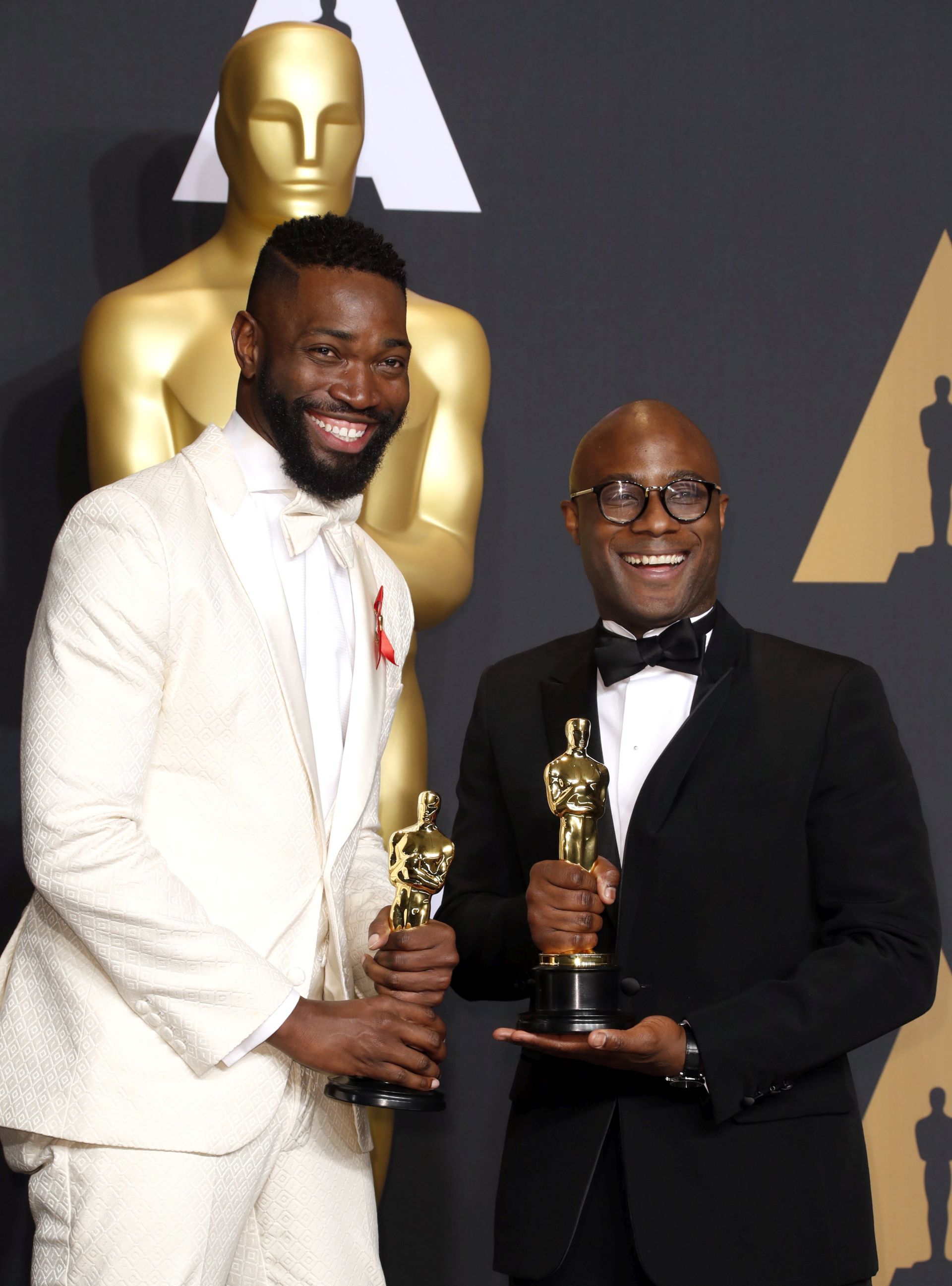 epa05818052 Barry Jenkins (R) and Tarell Alvin McCraney hold the Oscar for Best Adapted Screenplay for 'Moonlight' in the press room during the 89th annual Academy Awards ceremony at the Dolby Theatre in Hollywood, California, USA, 26 February 2017.  The Oscars are presented for outstanding individual or collective efforts in 24 categories in filmmaking.  EPA/PAUL BUCK