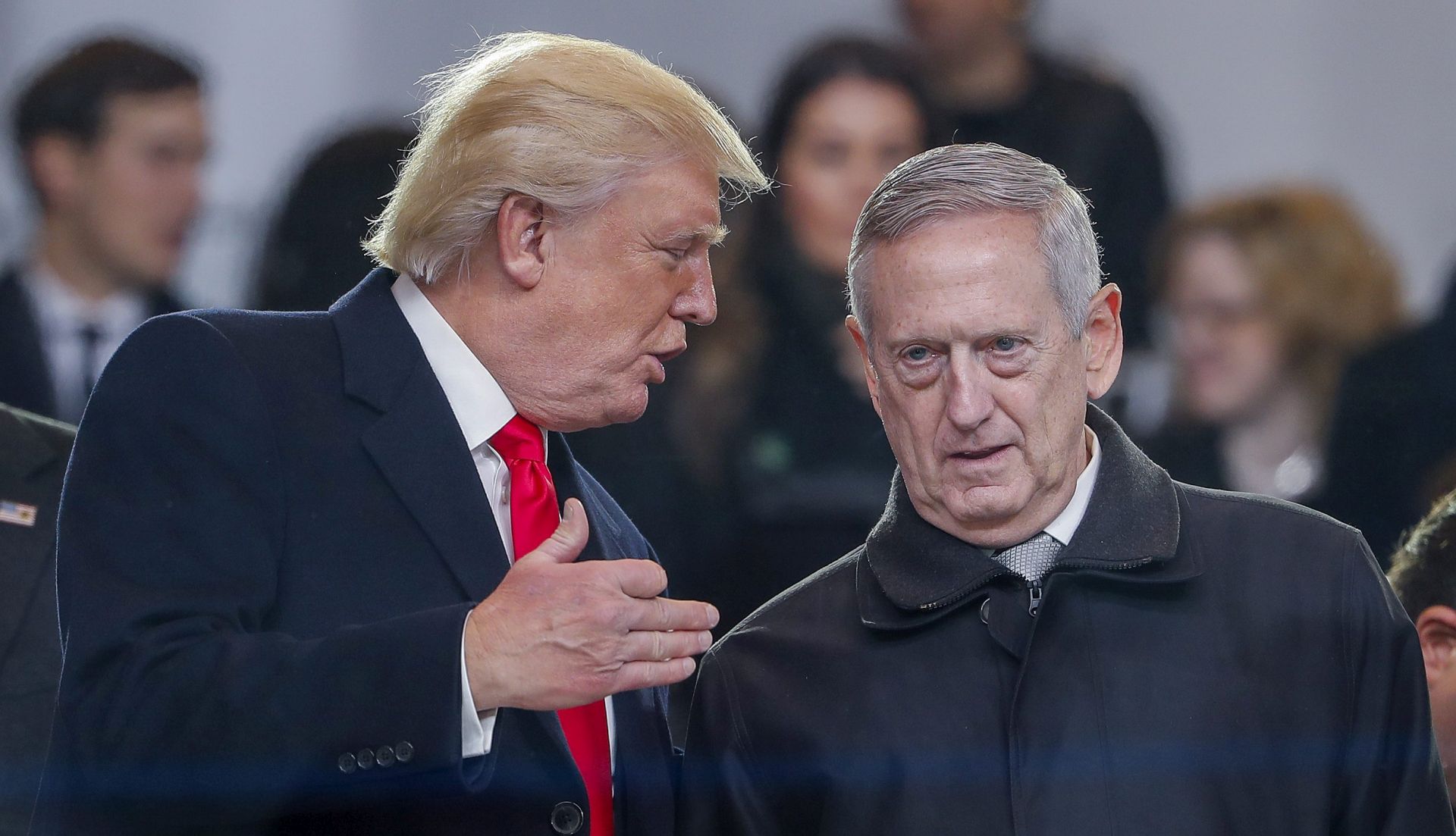 epa05736779 US President Donald J. Trump (L) greets new Secretary of Defense James 'Mad Dog' Mattis (R) in the reviewing stand during the Inaugural Parade after Trump took the oath of office as the 45th President of the United States in Washington, DC, USA, 20 January 2017. Trump won the 08 November 2016 election to become the next US President.  EPA/ERIK S. LESSER
