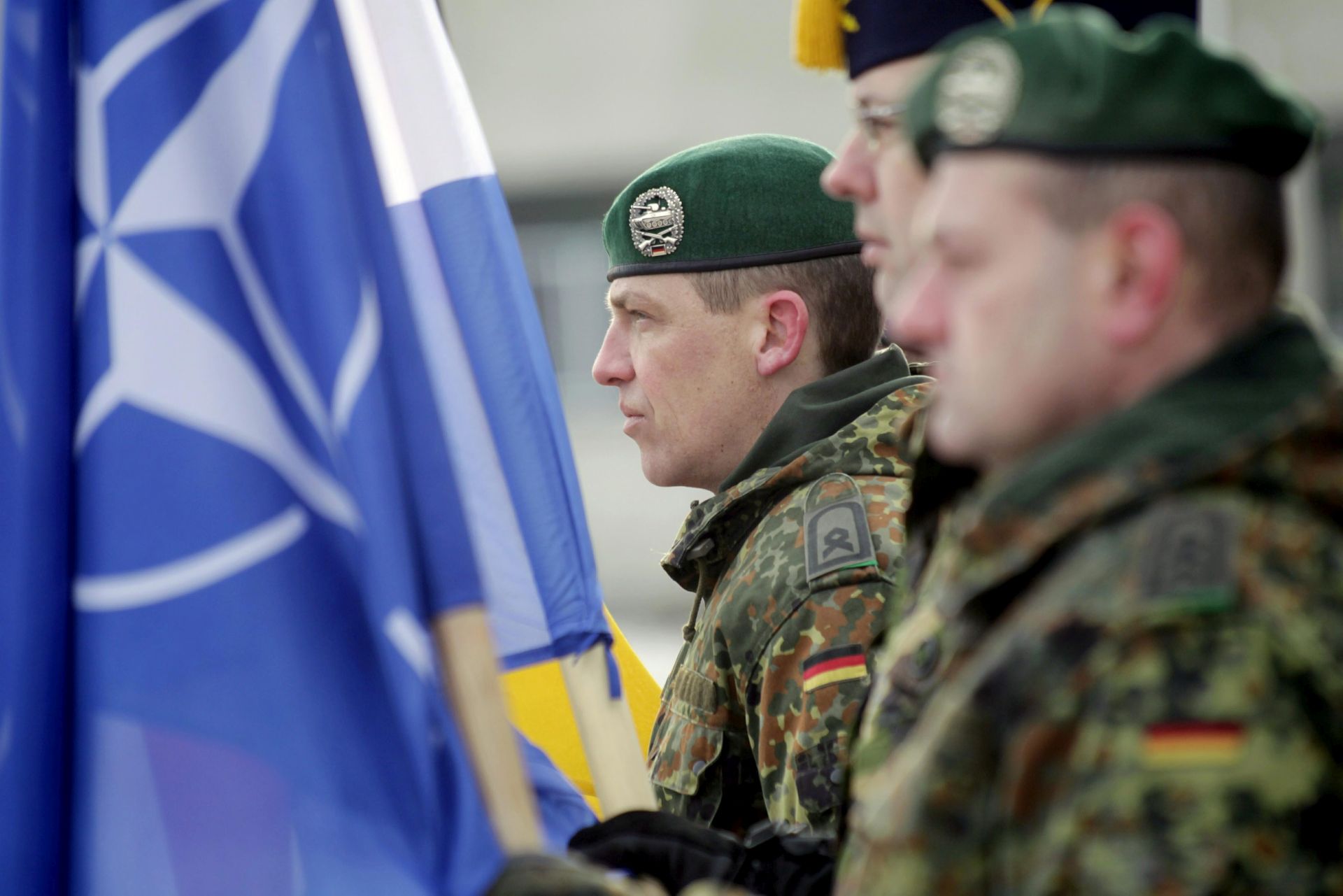epa05776009 Soldiers partake in a welcoming ceremony for the first troops of the NATO enhanced Forward Presence (eFP) battalion group at the Rukla base in Rukla, Lithuania, 07 February 2017. NATO decided to station a multinational battalion in each of the three Baltic countries in response to Russia's intervention in Ukraine and military activity in the region.  EPA/VALDA KALNINA