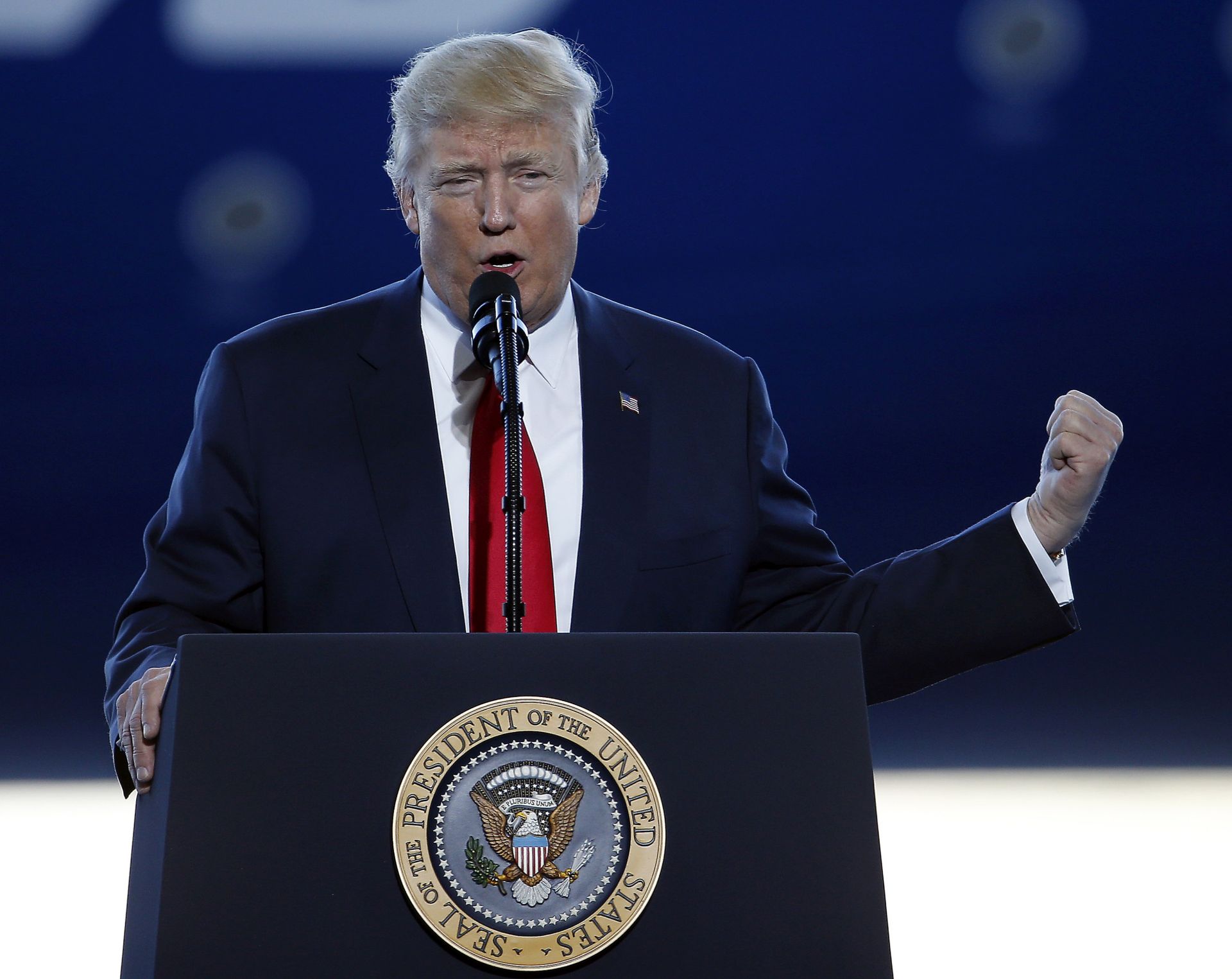 epa05800495 US President Donald J. Trump makes remarks at the unveiling of Boeing's new 787-10 Dreamliner at their production facility in North Charleston, South Carolina, USA, 17 February 2017.  EPA/STEPHEN B. MORTON