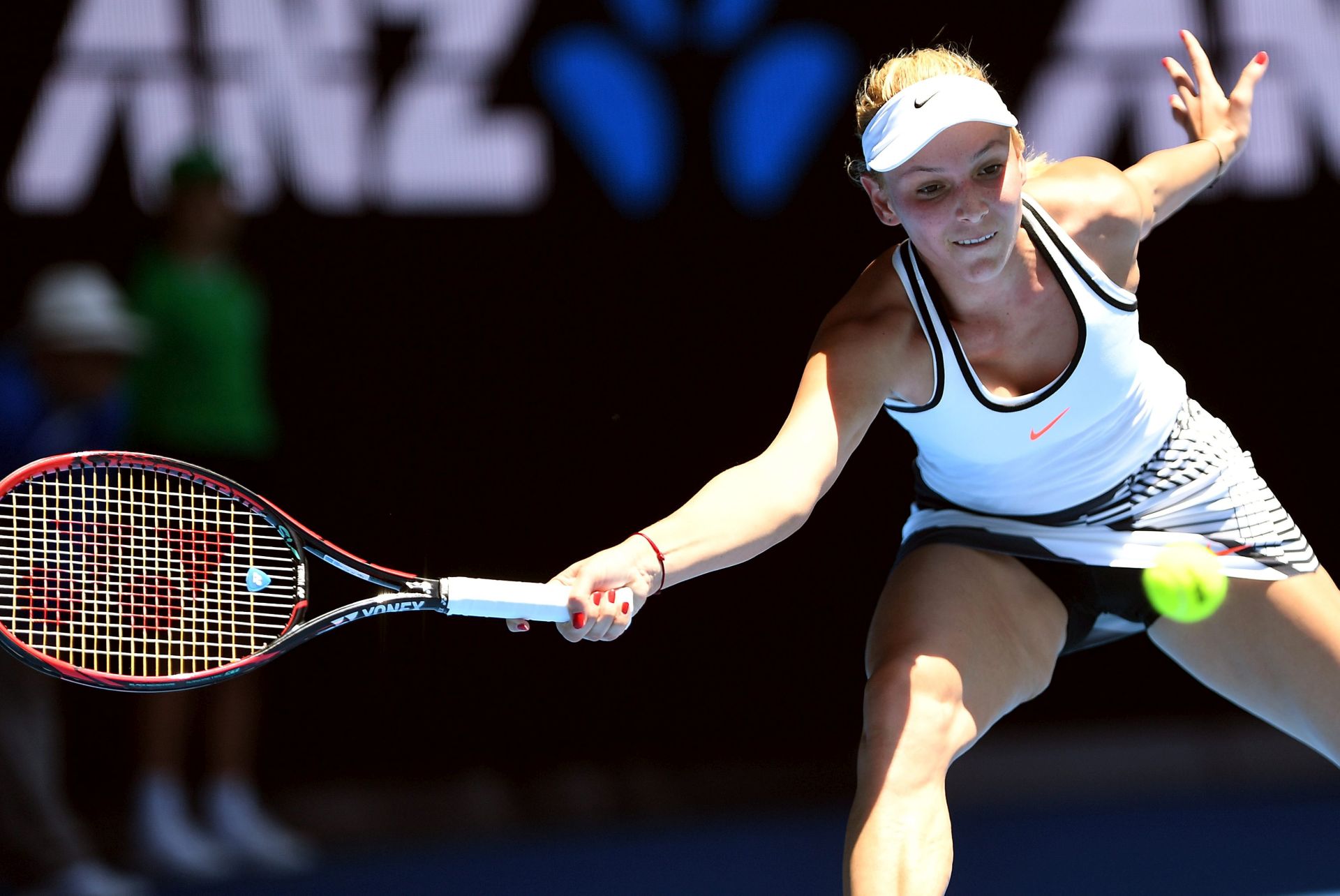 epa05729301 Donna Vekic of Croatia in action against Caroline Wozniacki of Denmark during round two of the Women's Singles at the Australian Open Grand Slam tennis tournament in Melbourne, Victoria, Australia, 19 January 2017.  EPA/DEAN LEWINS  AUSTRALIA AND NEW ZEALAND OUT