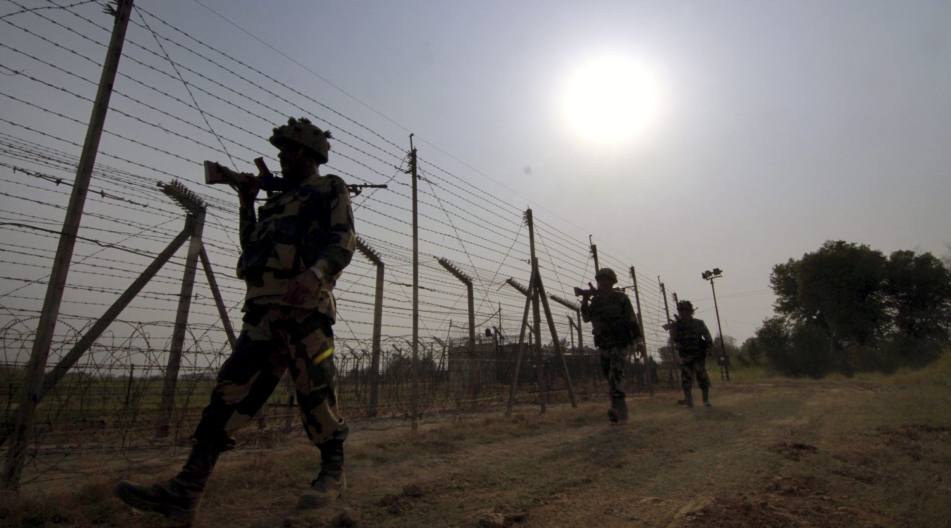 epa05561499 (FILE) A file picture dated 10 May 2016 shows members of the Indian Border Security Force (BSF) patrolling near the fence at the India-Pakistan International Border at Budwar post of Arnia sector, about 40km from Jammu, the winter capital of Kashmir, India. According to reports, the Indian army said it has carried out 'surgical strikes' against alleged militants along its Line of Control (LoC) with Pakistan, in Kashmir, on 29 September 2016. Indian authorities said that 'significant casualties' have been inflicted to 'terrorist units.' Pakistan, in response to India's claims, denied the strikes calling them a cross-border fire, media added. Both India and Pakistan claim the disputed mountainous region of Kashmir.  EPA/JAIPAL SINGH