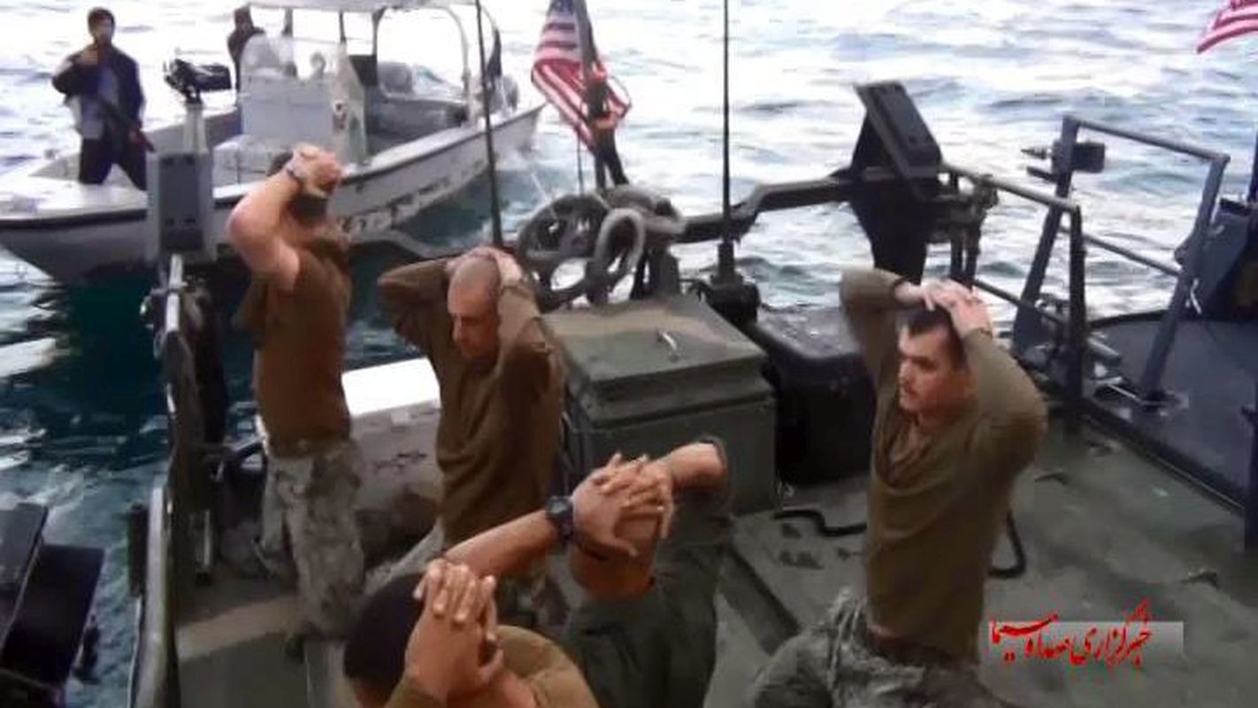epa05100521 A handout TV grab made available by the official website of Iranian state television (IRIB) on 13 January 2016 shows American military personnel on their boat after they were captured by the Iranian Revolutionary Guard Corps (IRGC), at an undisclosed location in Iran, 12 January 2016. Ten American military personnel and two US naval vessels held by Iran have been released, Iranian authorities said in a statement on 13 January. The two US boats strayed two kilometers into Iranian waters on 12 January and were detained by Iran's Revolutionary Guards.  EPA/IRIB OFFICIAL WEBSITE / HANDOUT BEST QUALITY AVAILABLE HANDOUT EDITORIAL USE ONLY/NO SALES