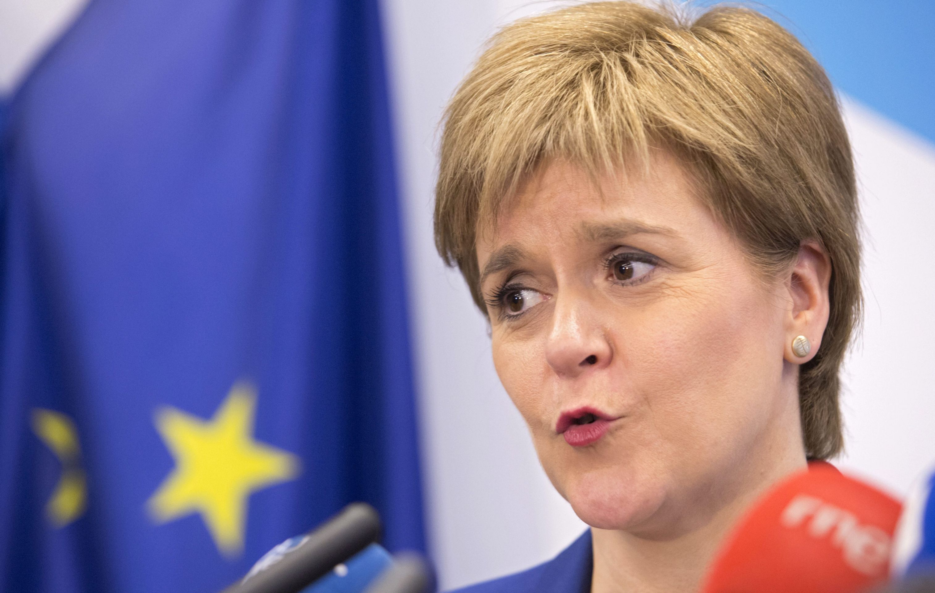 epa05397953 Scotland's First Minister Nicola Sturgeon holds a news conference at the Scotland House on her visit in Brussels, Belgium, 29 June 2016. Sturgeon met European Parliament leaders for talks on the future of Scotland's relation with the EU. A slim majority of people in Britain had in a referendum on 23 June voted to leave the European Union (EU).  EPA/GEOFFREY VAN DER HASSELT / POOL