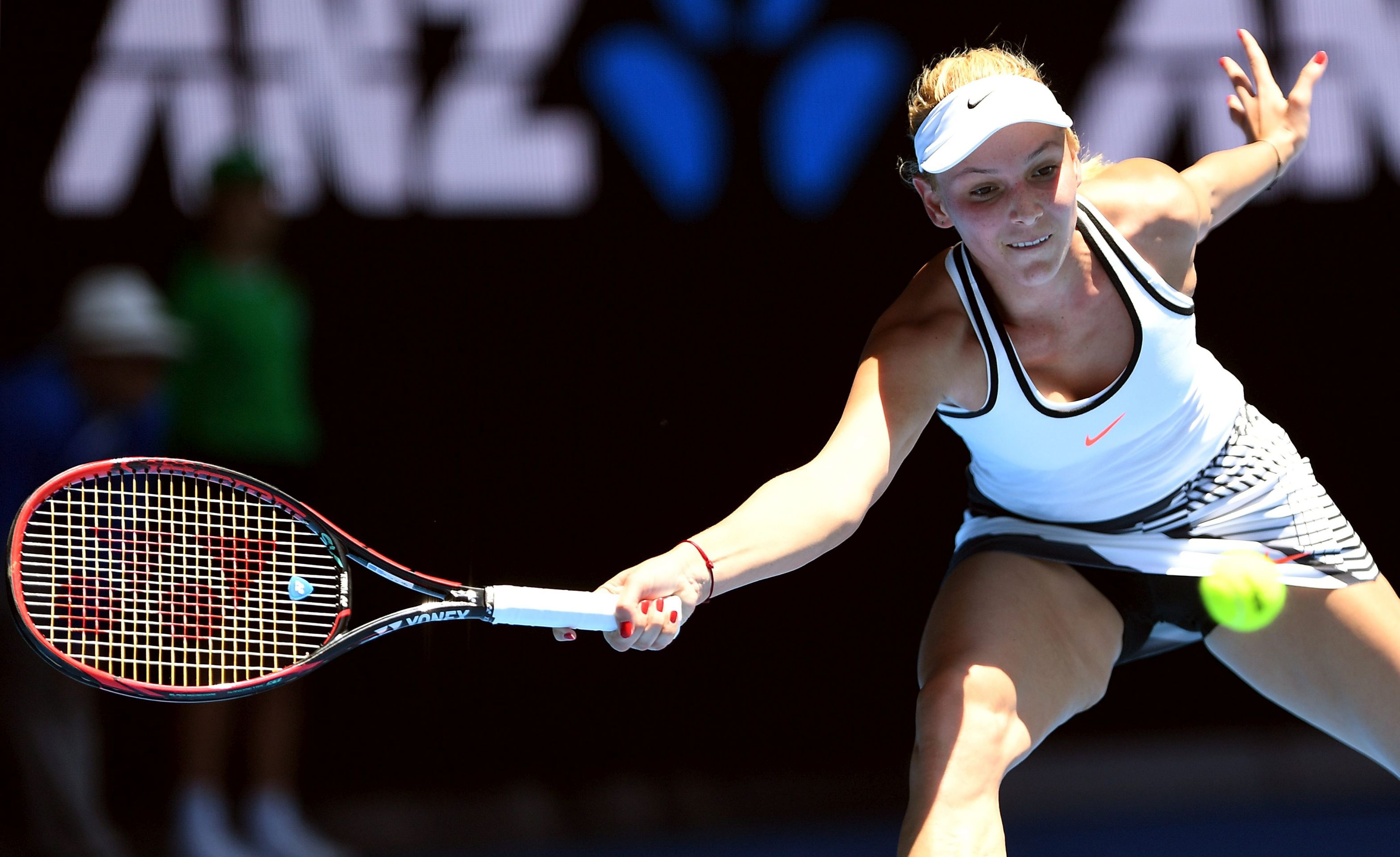epa05729301 Donna Vekic of Croatia in action against Caroline Wozniacki of Denmark during round two of the Women's Singles at the Australian Open Grand Slam tennis tournament in Melbourne, Victoria, Australia, 19 January 2017.  EPA/DEAN LEWINS  AUSTRALIA AND NEW ZEALAND OUT