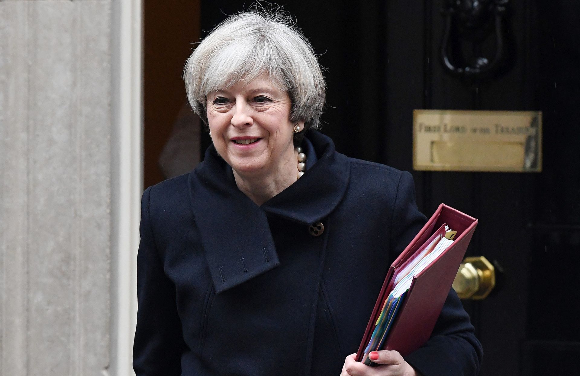 epa05764343 British Prime Minister Theresa May departs 10 Downing Street in London, Britain, 01 February 2017. Parliament is holding its final day in a two-day long debate on the bill to trigger Article 50 and Britain's exit from the EU. MP's will vote to trigger Article 50 on 01 February.  EPA/ANDY RAIN