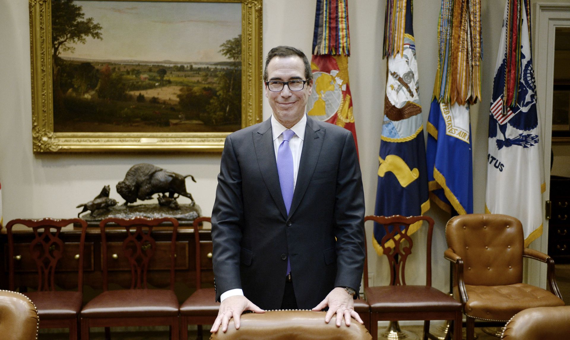 epa05809034 US Treasury secretary, Steve Mnuchin looks on before discussing  the Federal budget  in the Roosevelt Room of the White House in Washington, DC, USA, 22 February 2017.  EPA/Olivier Douliery / POOL