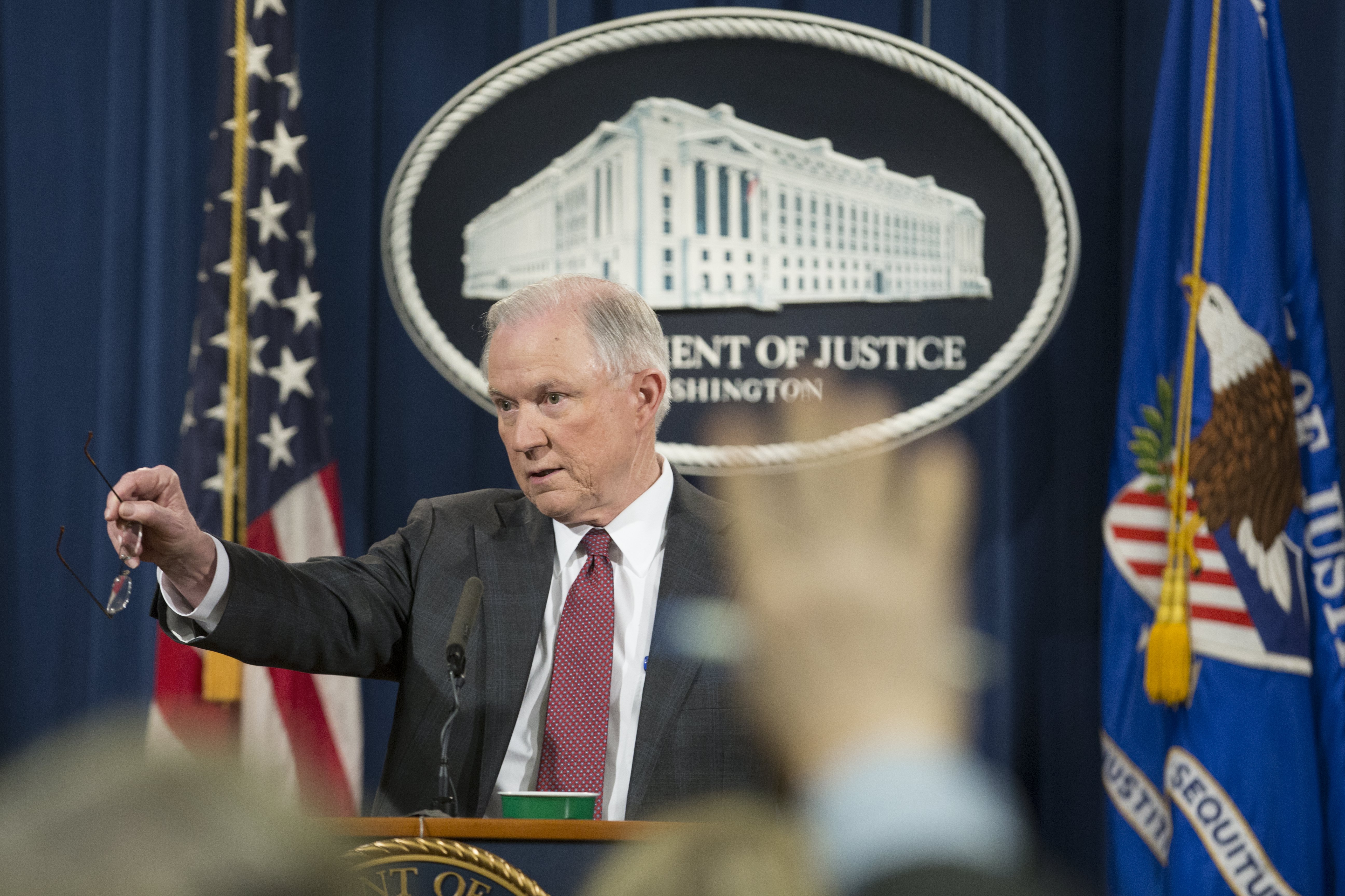 epa05825850 US Attorney General Jeff Sessions holds a news conference in which he recused himself from any current or future investigations into Russia ties to the Trump campaign, at the Justice Department in Washington, DC, USA, 02 March 2017. Some Democrats have asked Sessions to resign, with some Republicans asking that he recuse himself, after news broke that Sessions met on two occasions with Russia's ambassador and didn't disclose this information during his confirmation hearing.  EPA/MICHAEL REYNOLDS