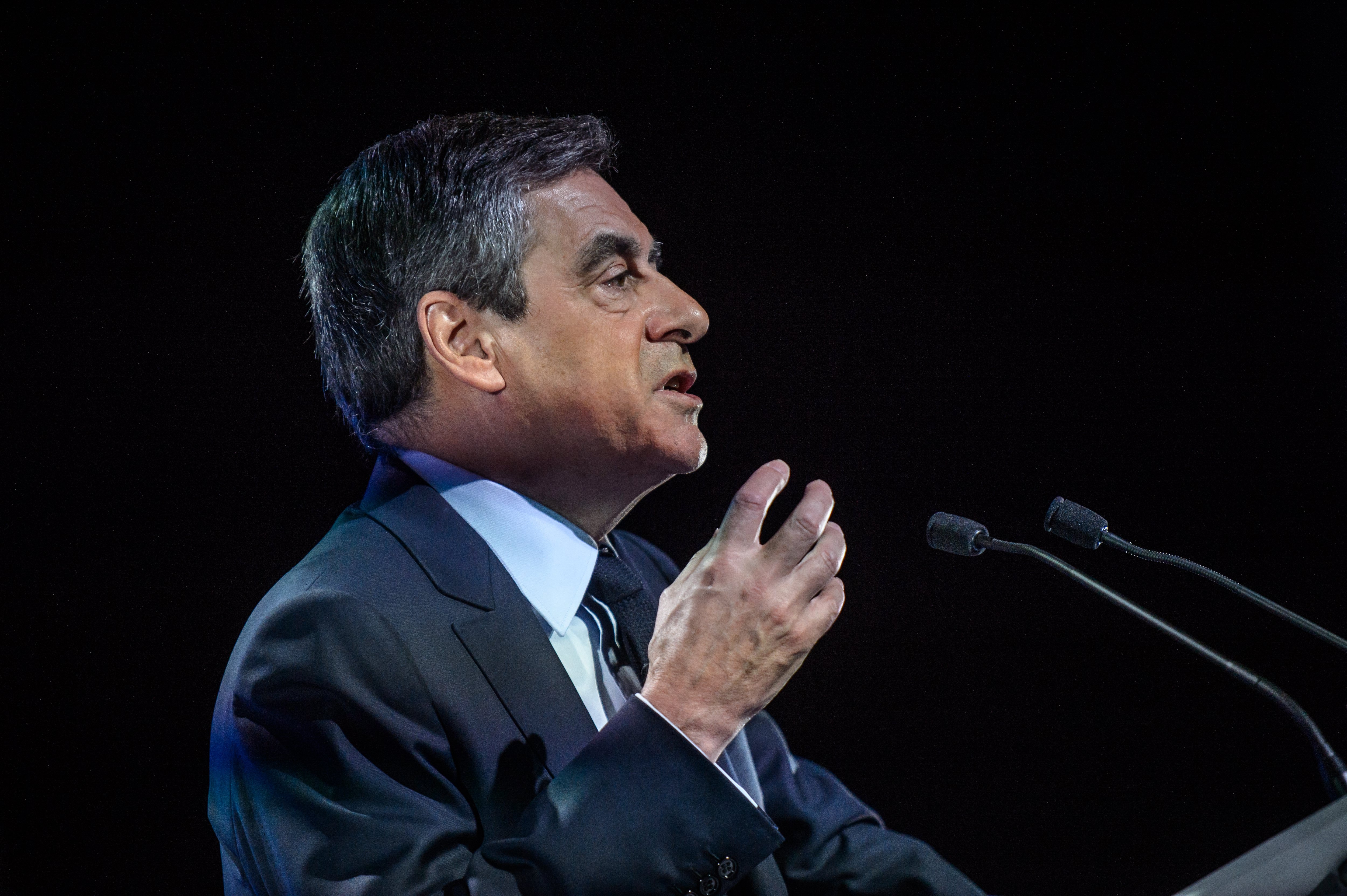 epa05829338 Les Republicans party candidate for 2017 presidential election, Francois Fillon delivers a speech during a campaign event in Aubervilliers, near Paris, France, 04 March 2017. During a press conference Fillon announced that he will be placed under formal investigation but vows to remain as candidate for presidential election. Francois Fillon's case on previous employment of his wife Penelope as a parliamentary aide while he was an MP had been put in the hands of judges, receiving full judicial inquiry. French presidential elections are planned for 23 April and 07 May 2017.  EPA/CHRISTOPHE PETIT TESSON