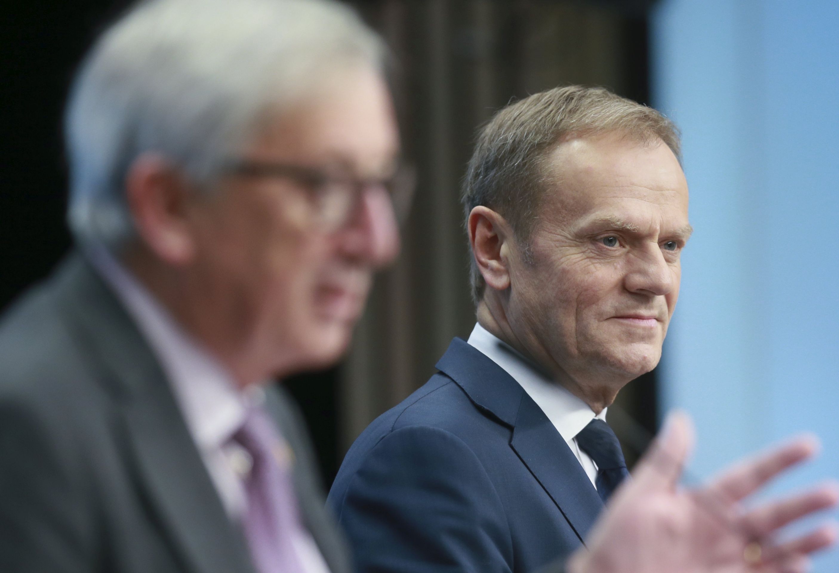 epa05840707 EU Commission President Jean-Claude Juncker (L) and European Council President Donald Tusk (R) give a press briefing at the end of the second day of the European spring summit in Brussels, Belgium, 10 March 2017.  EPA/OLIVIER HOSLET