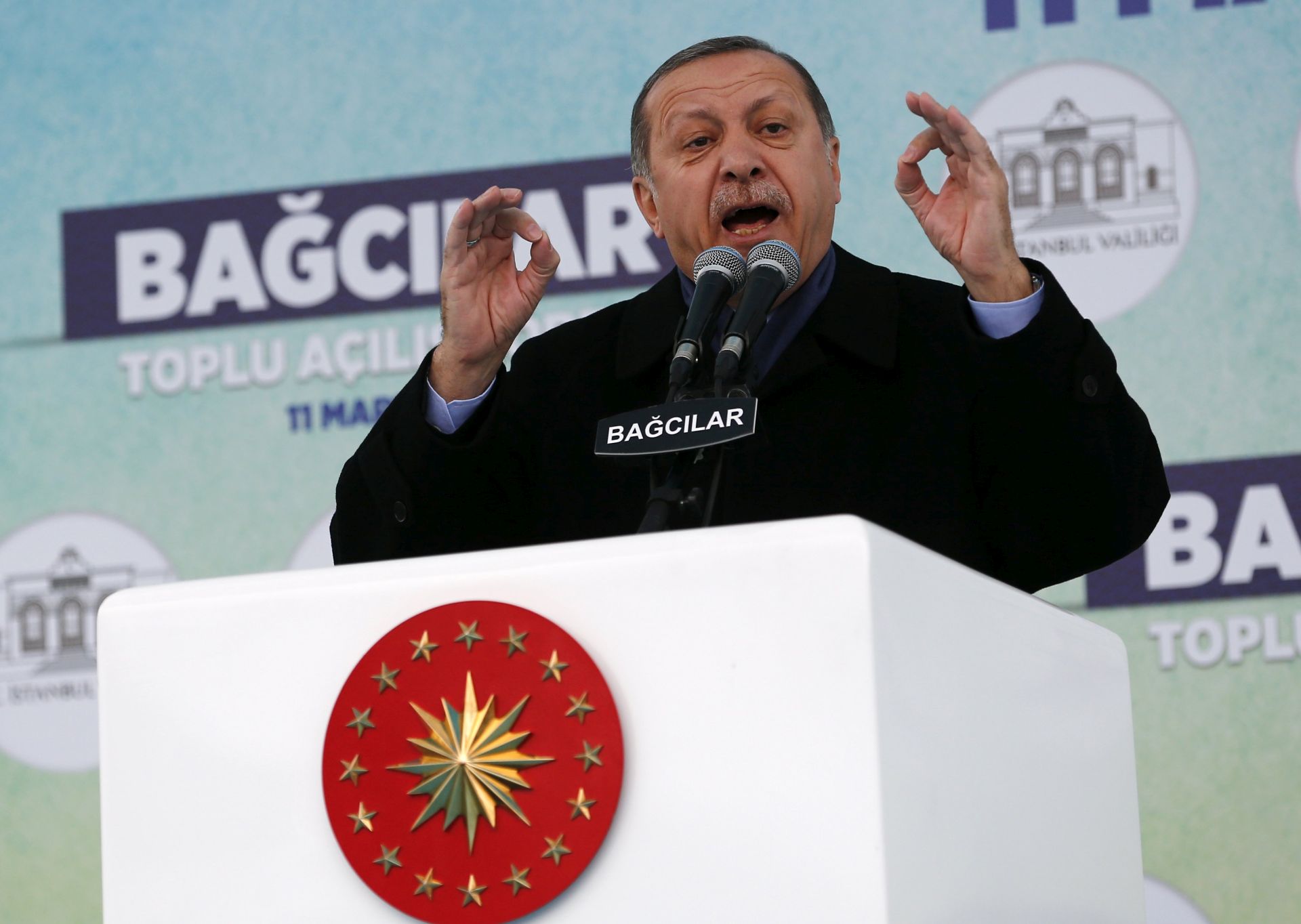 epa05842244 Turkish President Recep Tayyip Erdogan speaks to his supporters during the opening ceremony of the Bagcilar district subway station in Istanbul, Turkey, 11 March 2017. The Turkish parliament on 21 January approved a reform of the constitution to change the country's parliamentarian system of governance into a presidential one, which the opposition denounced as giving more power to Turkish president Recep Tayyip Erdogan. A referendum on the amendments is expected to be held in April.  EPA/SEDAT SUNA