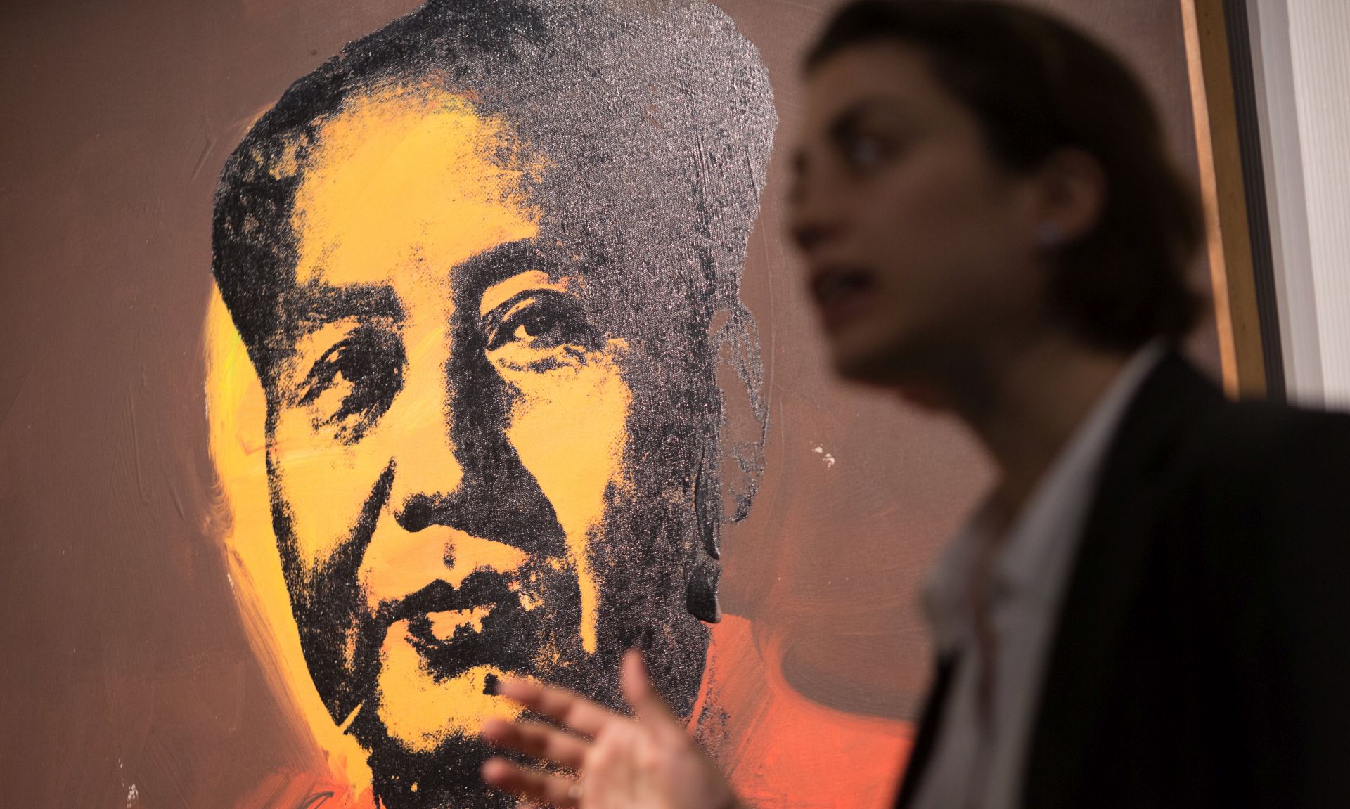 epa05853621 A view on the 'Mao', 1973, acrylic and silkscreen ink on canvas painting by US artist Andy Warhol on display during the Sotheby’s Hong Kong Modern and Contemporary Art Evening Sale preview at Sotheby's in Hong Kong, China, 17 March 2017. The painting is estimated to fetch at least 12 million US dollars at an auction on 02 April 2017 at the Hong Kong Convention and Exhibition Centre.  EPA/JEROME FAVRE