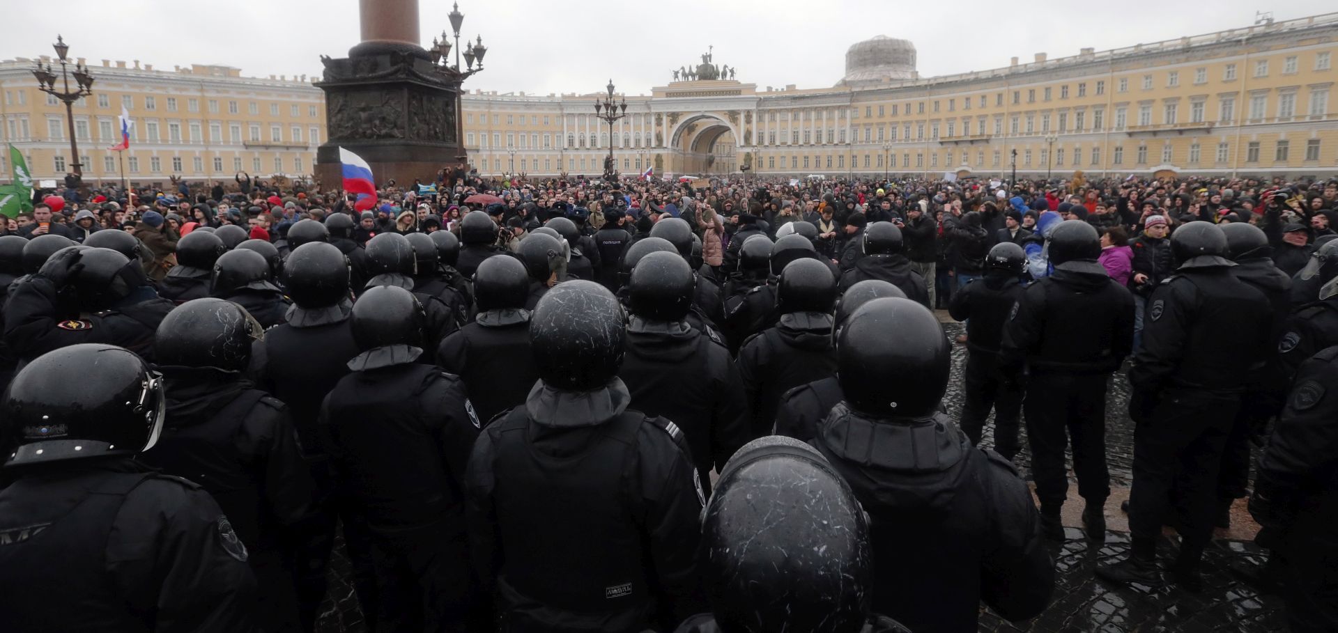 epa05872068 People take part in an opposition rally at the Dvortsovaya (Palace) square in St.Petersburg, Russia, 26 March 2017. in St.Petersburg, Russia, 26 March 2017. Thousands of Russians throughout Russia took part in so-called anti-corruption rallies organized by opposition despite of authorities ban. Earlier in March 2017 Russian opposition leader Alexei Navalny's Anti-Corruption Fund released a report accusing Russian Prime Minister Dmitry Medvedev in owning huge properties. According to reports, dozens of demonstrators have been detained across the country as they called for the resignation of Russian Prime Minister Dmitry Medvedev over corruption allegations.  EPA/ANATOLY MALTSEV