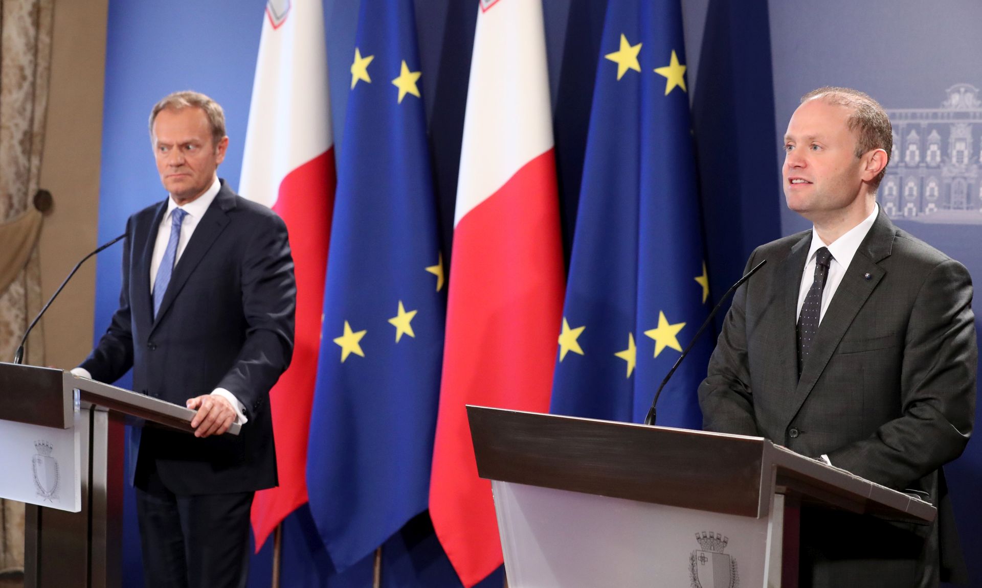 epa05880376 Donald Tusk (L), President of the European Council speaks during the joint press conference with Maltese Prime Minister Joseph Muscat (R) at the Auberge de Castille in Valletta, Malta, 31 March 2017.  Donald Tusk on 31 March 2107 issued draft guidelines on how the EU intends to negotiate Britain's departure from the European Union. British Prime Minister Theresa May formally triggered the Brexit process on sending the Article 50 notification to Donald Tusk on 29 March 2017.  EPA/DOMENIC AQUILINA