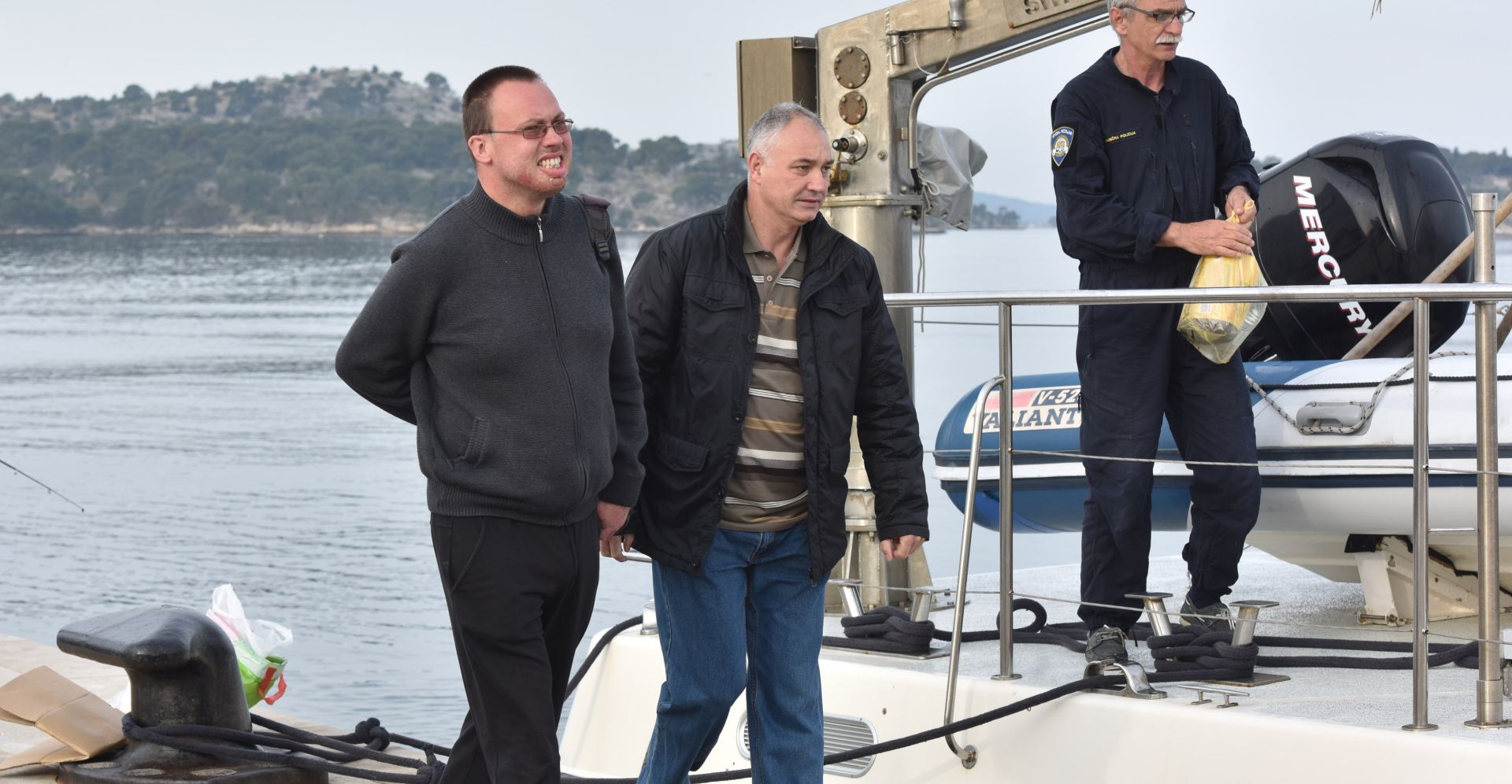 24.03.2017., Sibenik - Frane Lucic, jedini prezivjeli vatrogasac kornatske tragedije, te drugi sudionici tog dogadjaja policijskim brodm otisli su na otok gdje ce biti obavljena rekonstrukcija. 
Photo: Hrvoje Jelavic/PIXSELL