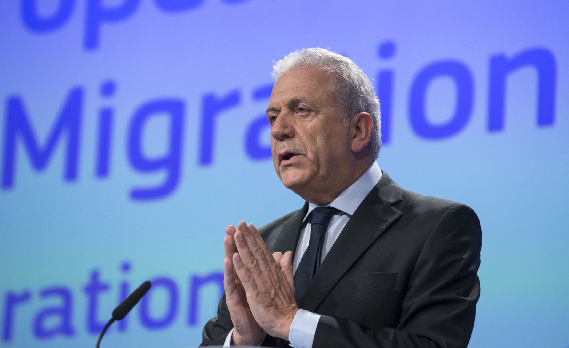 epa05824261 EU Commissioner for migration and home affairs Dimitris Avramopoulos gives a press conference to present a package of measures on migration in Brussels, Belgium, 02 March 2017. The package of measures on migration commissions, includes new guidance on returns, and updates of progress on some of the key migration work-strands which are part of the European Union's comprehensive migration policy.  EPA/OLIVIER HOSLET