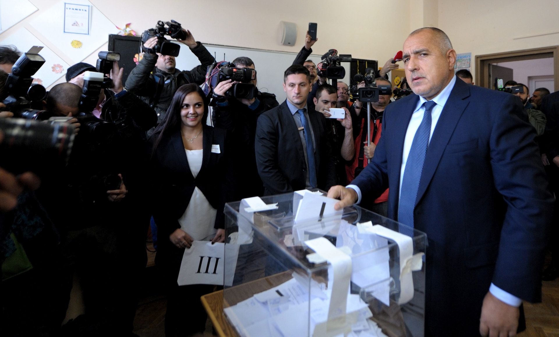 epa05629460 Bulgarian Prime Minister Boyko Borisov casts his vote in the second round of Presidential elections in Bulgaria, at a polling station in Sofia, Bulgaria, 13 November 2016. Some 6.8 million Bulgarians vote in a runoff for a new president of EU member state on the Balkans. The vote will also decide the future of the center-right government in Sofia. Prime Minister Boyko Borisov said his cabinet would resign if the candidate of his GERB party, Tsetska Tsatcheva, lost the runoff. In the first round of voting on November 06, the candidate of the oppositional Socialist Party, the former general Roumen Radev, came in first.  EPA/BORISLAV TROSHEV