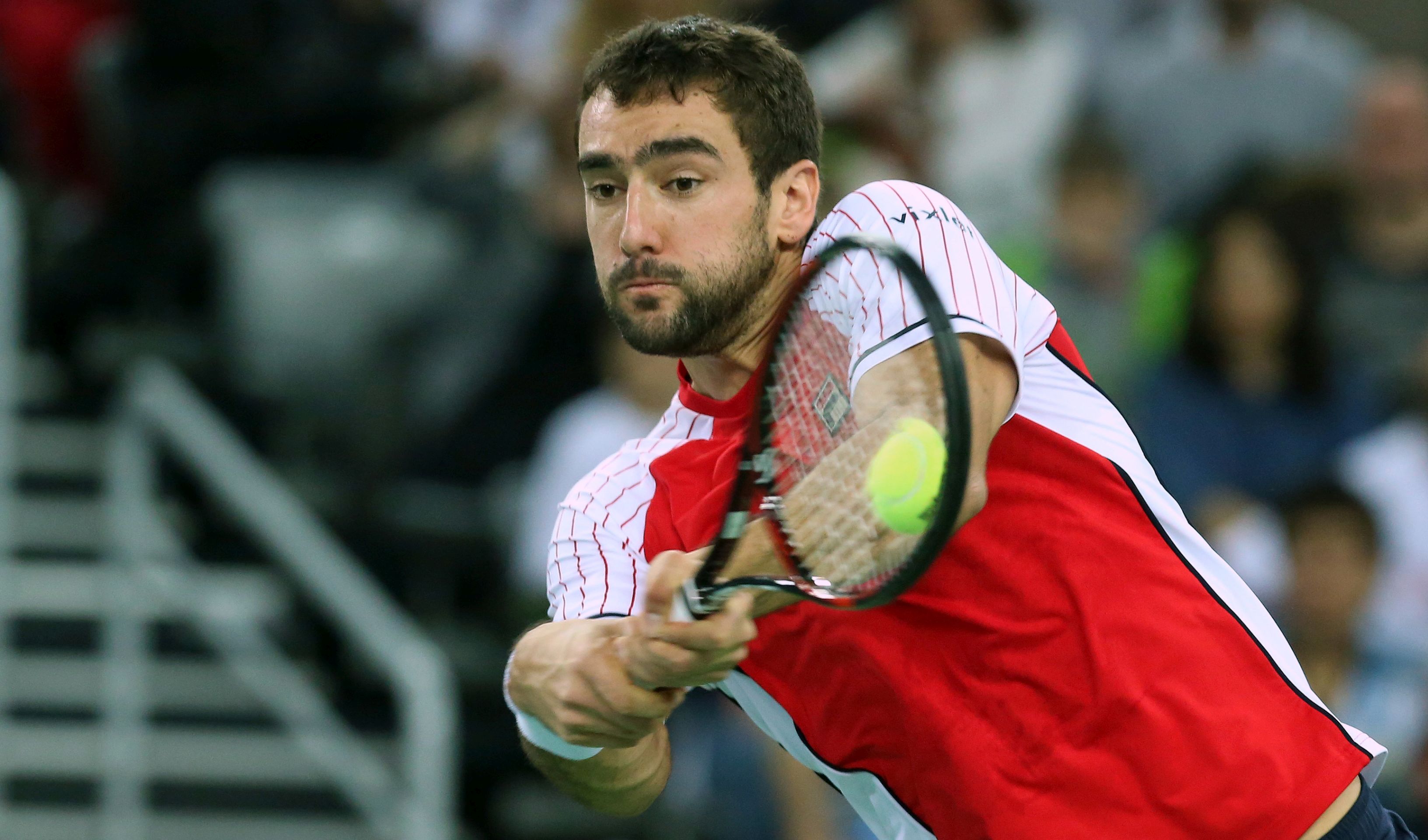 Zagreb, 26.11.2016. Drugog dana finala Davis Cupa izmeðu reprezentacija Hrvatske i Argentine na teren su izali Marin Èiliæ i Ivan Dodig, koji su zaigrali protiv argentinskog para, Juana Martina del Potra i Leonarda Mayera. Na fotografiji Marin Èiliæ.
foto HINA/ Daniel KASAP/ mm