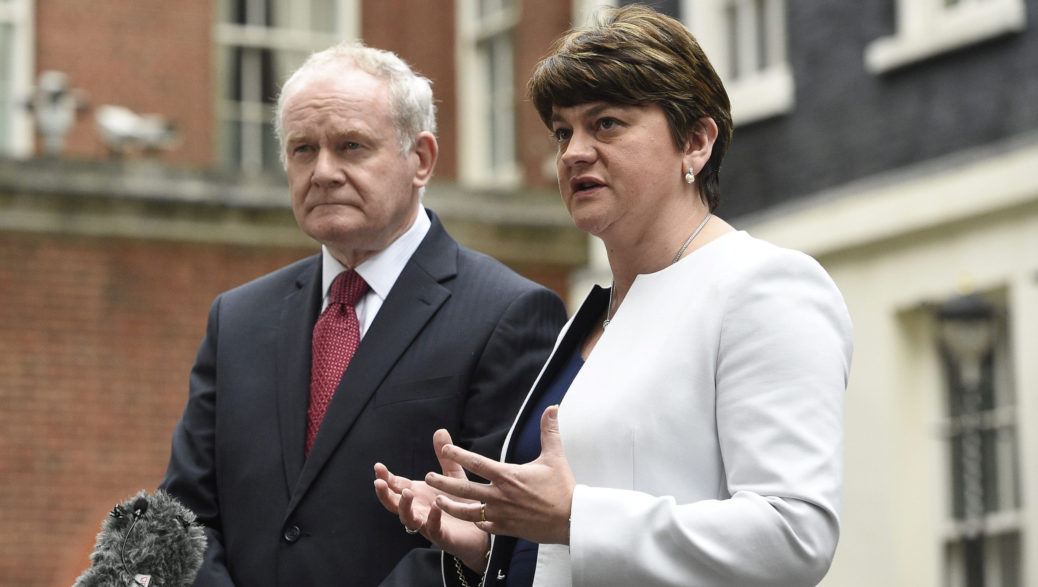 epa05712151 (FILE) - A file photograph showing Northern Ireland First Minister, Arlene Foster (R) and Martin McGuinness (L) Deputy First Minister of Northern Ireland speaking to journalists after attending a meeting of the Joint Ministerial Committee in N10 Downing street in London, Britain, 24 October 2016. Media reports on 12 January 2017 state that Martin McGuinness who resigned on 09 January 2017 in protest against the handling of the Renewable Heat Incentive (RHI) scheme, has told the Irish Prime Minister Enda Kenny he is willing to meet the Democratic Unionist Party (DUP) about the crisis that looks set to lead to snap elections. Under Northern Ireland's power-sharing agreement, his departure meant DUP First Minister Arlene Foster also lost her job, and under Stormont rules, Sinn Fein have until 16 January 2017 to nominate a new deputy first minister, or the British secretary of state must call an election.  EPA/FACUNDO ARRIZABALAGA
