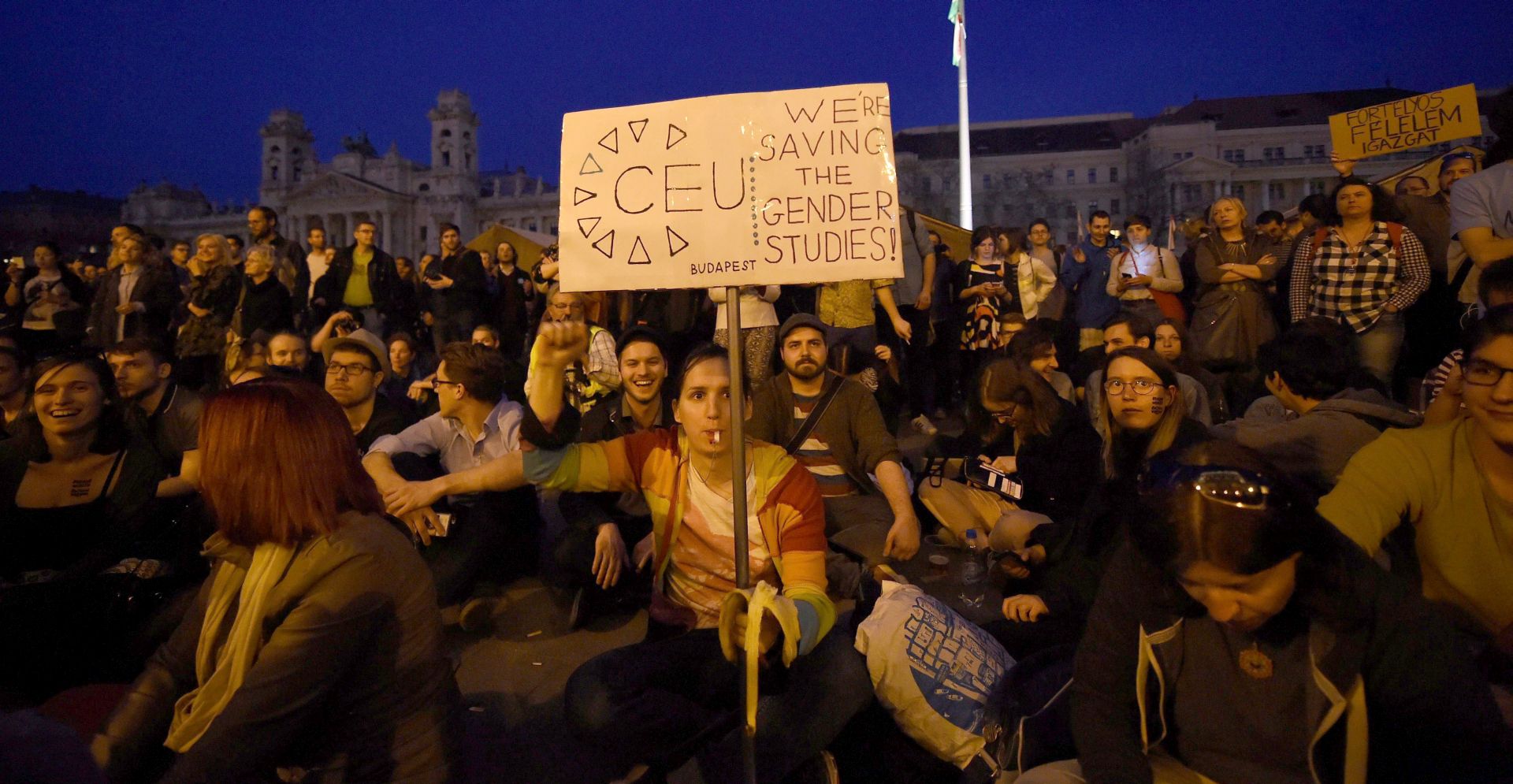epa05888353 Demonstrators protest against an amendment of the higher education law, seen by many as an action aiming at the closure of the Central European University, founded by Hungarian born American billionaire businessman George Soros, outside the university's central building in Budapest, Hungary, 04 April 2017. The amendment regulating the activities of foreign universities in Hungary was passed by the Parliament on 04 April and demonstrators demanded that the President of Hungary should veto the bill.  EPA/ZOLTAN BALOGH HUNGARY OUT
