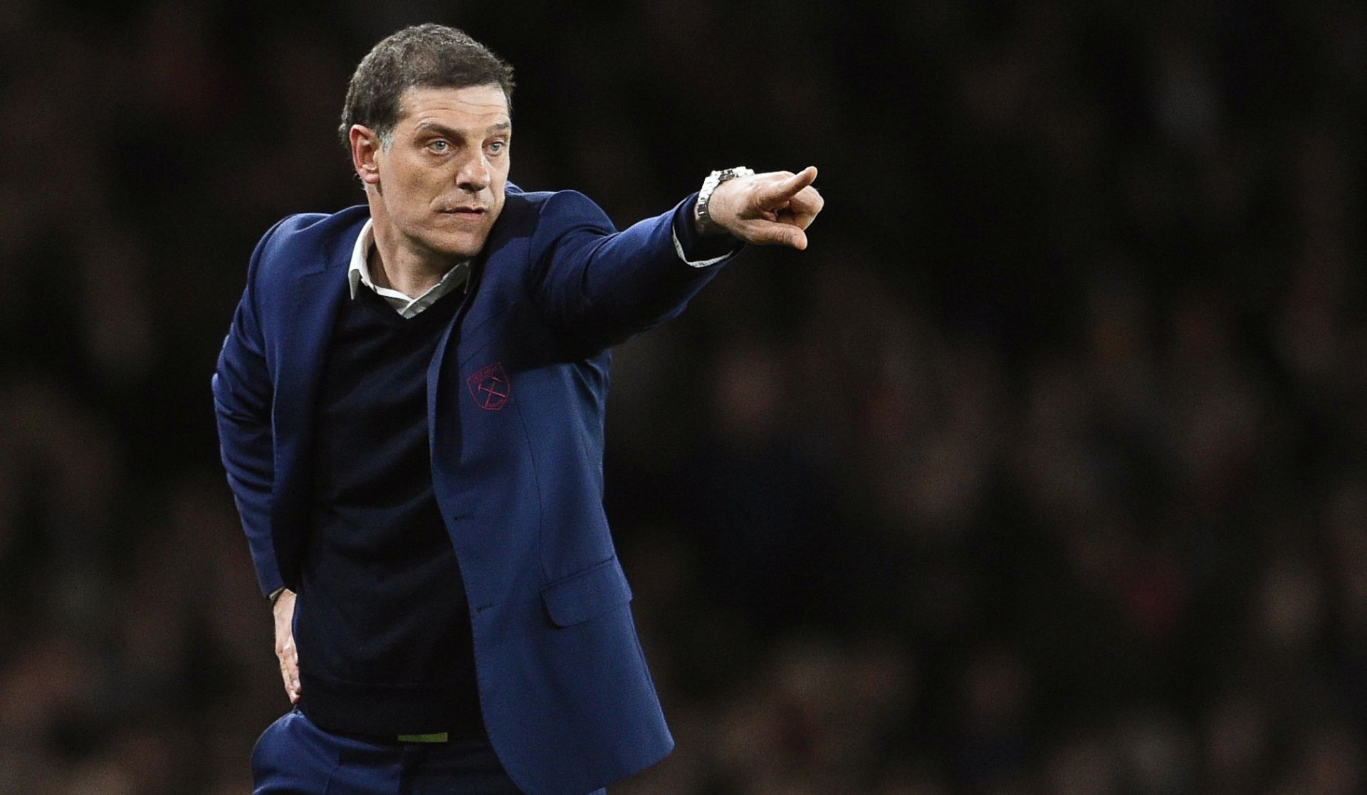 epa05891164 West Ham United manager Slaven Bilic reacts during the English Premier League soccer match between Arsenal FC and West Ham United in London, Britain, 05 April 2017.  