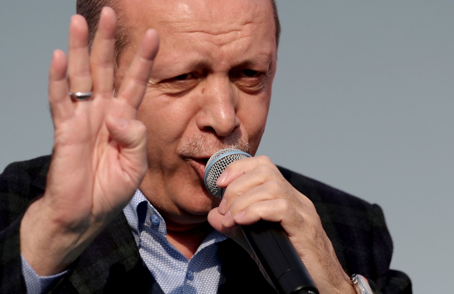 epa05897459 Turkish President Recep Tayyip Erdogan  speaks during a 'Vote Yes' rally in Istanbul, Turkey, 08 April 2017. A referendum on the constitutional reform in Turkey will be held on 16 April. The reform, passed by Turkish parliament on 21 January, would change the country's parliamentarian system of governance into a presidential one, which the opposition denounced as giving more power to Turkish president Recep Tayyip Erdogan.  EPA/SEDAT SUNA