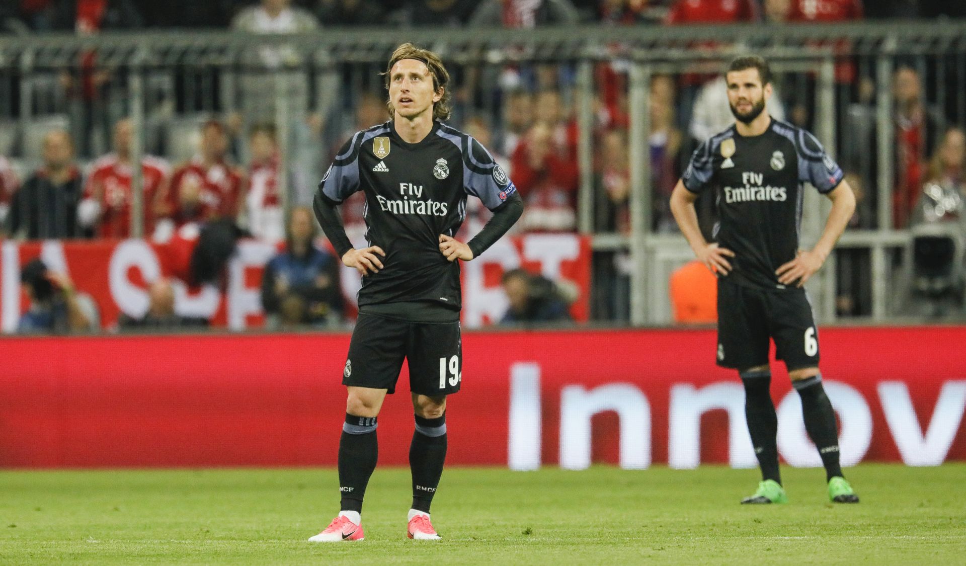 epa05905011 Real Madrid's Luka Modric (L) and Nacho react after conceding a goal during the UEFA Champions League quarter final, first leg soccer match between Bayern Munich and Real Madrid at Allianz Arena in Munich, Germany, 12 April 2017.  EPA/RONALD WITTEK