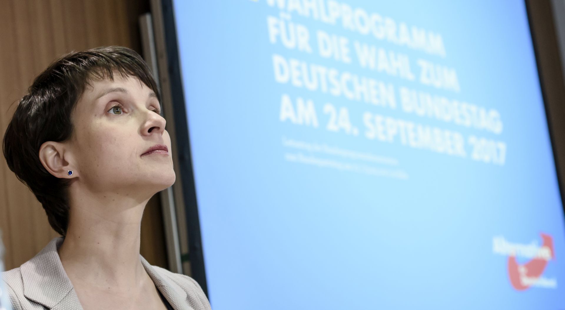 epa05914963 (FILE) -  The Federal chairwoman of the German party 'Alternative for Germany‘ (AfD), Frauke Petry sits in front of a projection reading 'Electoral Program for the election of the German Parliament on 24 September 2017' during a press conference on the electoral program in Berlin, Germany, 09 March 2017 (reissued 19 April 2017). Petry said in a video message posted on Facebook on 19 April 2017 that she was not running as top candidate for the AfD party in the upcoming German elections on 24 September 2017.  EPA/CLEMENS BILAN