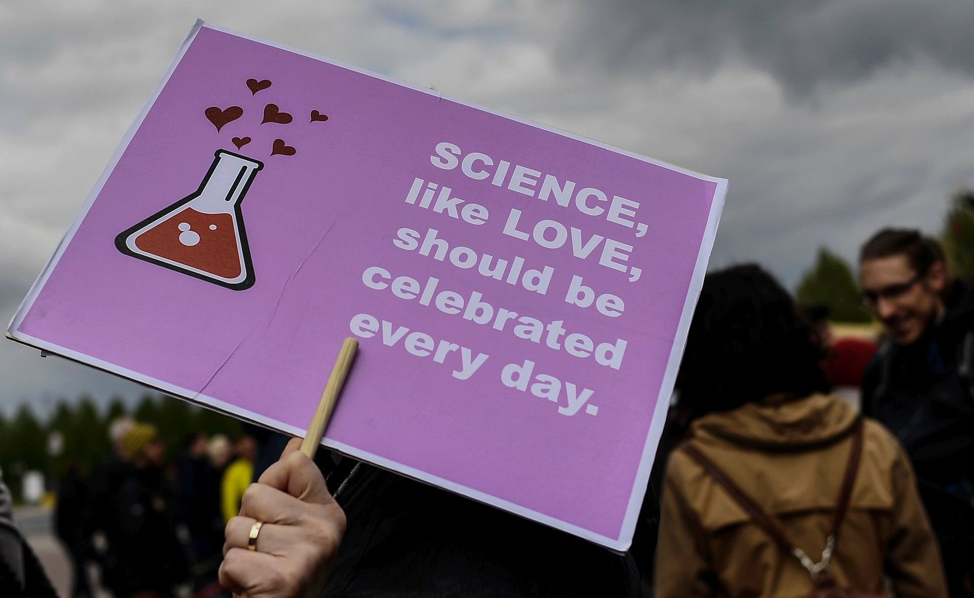 epa05921132 An demonstrator during the 'March for Science' at Theater Square, in Dresden, Germany, 22 April 2017. Hundreds of thousands of people in more than 400 locations across the globe are taking part in the March for Science to recognise scientific progress, raise awareness of scientific discovery, and defend scientific integrity.  EPA/FILIP SINGER