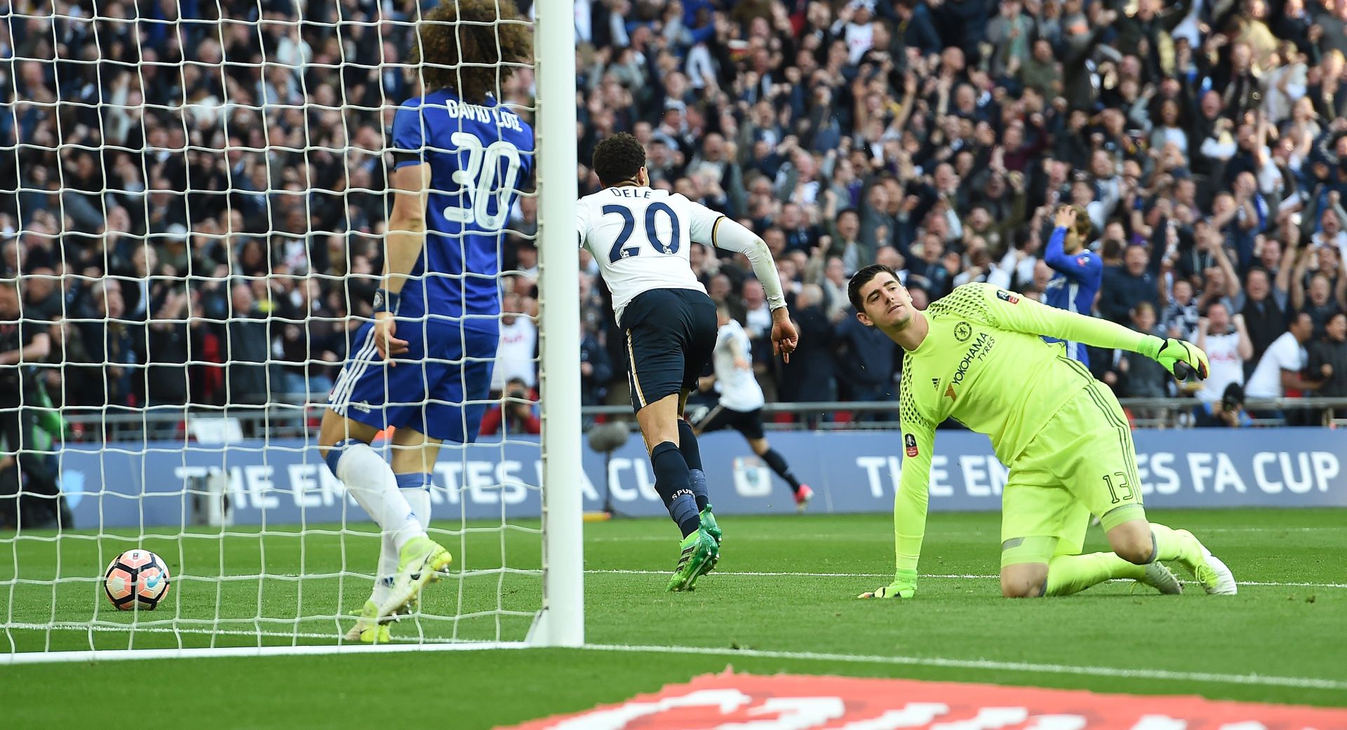 epa05921828 Tottenham's Dele Alli scores the 2-2 past Chelsea keeper Thibaul Cortois during the FA Cup semi final match Chelsea vs Tottenham at Wembley Stadium  in London, Britain, 22 April 2017.  EPA/ANDY RAIN EDITORIAL USE ONLY. No use with unauthorized audio, video, data, fixture lists, club/league logos or 'live' service. Online in-match use limited to 75 images, no video emulation. No use in betting, games or single club/league/player publications